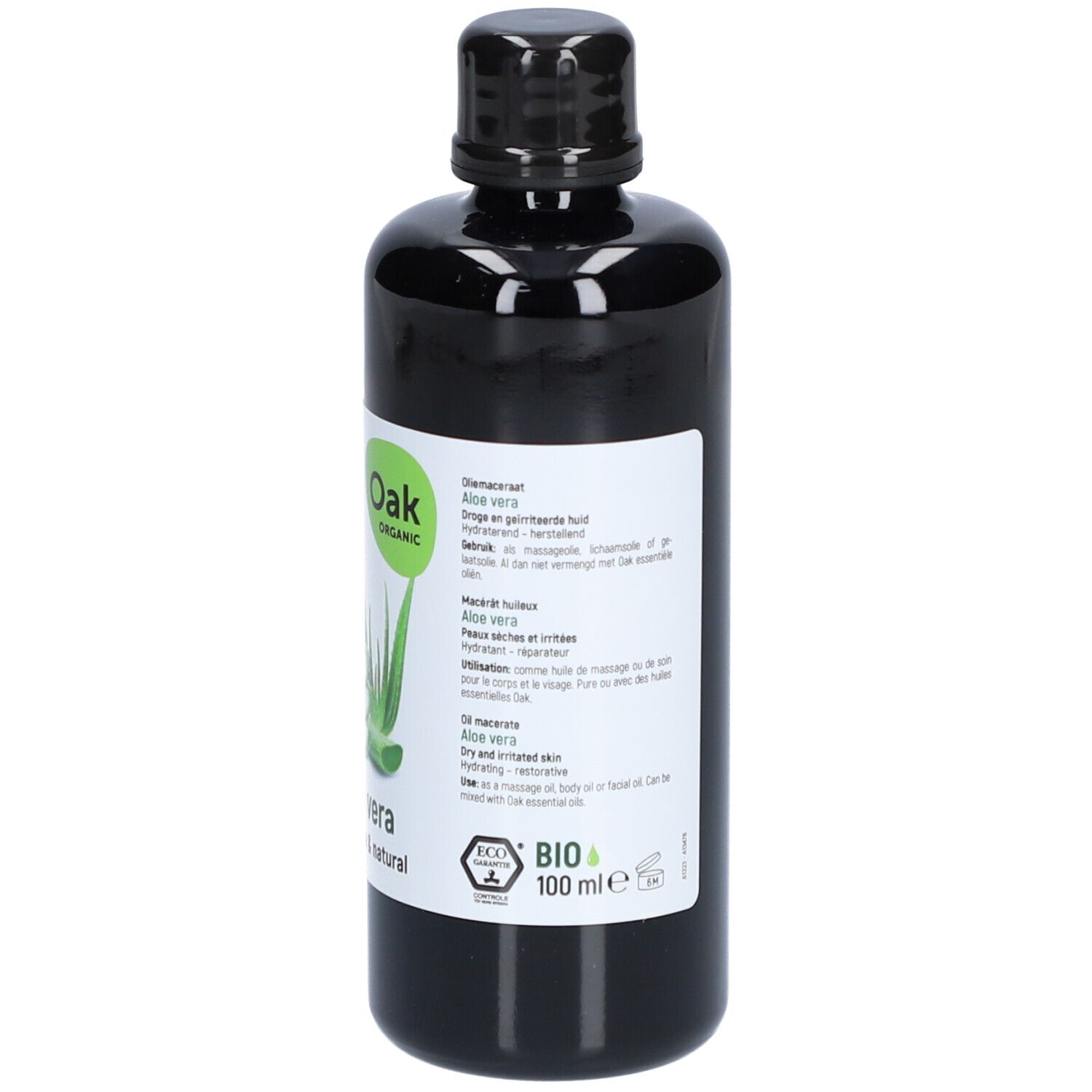 Flacon noir avec étiquette. Inscription: Oak Organic Aloe vera. Graphique vert et blanc. Volume: 100 ml. Label bio.