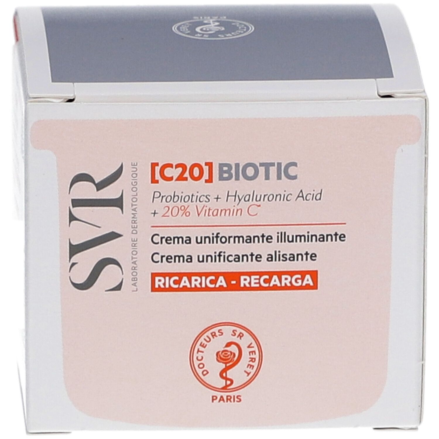 Boîte blanche avec informations produit. Inscription : [C20] BIOTIC, Crème uniformente illuminante. Logo.