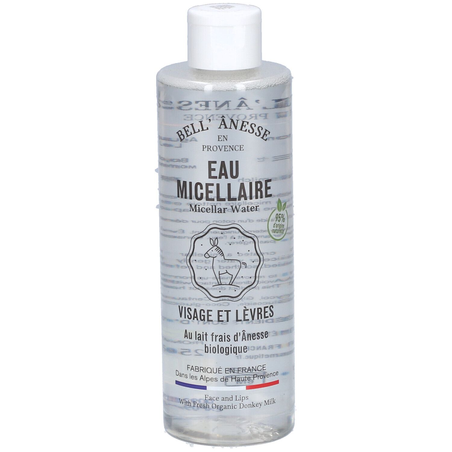 Flacon transparent avec bouchon blanc. Inscription: Bell'Anesse Bio Eau Micellaire. Pour visage et lèvres. Au lait d'ânesse bio.