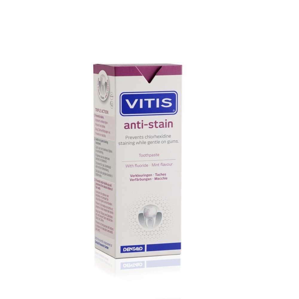 Doos met VITIS anti-vlekken. Blauw, roze en wit design. Bevat productinformatie en logo.