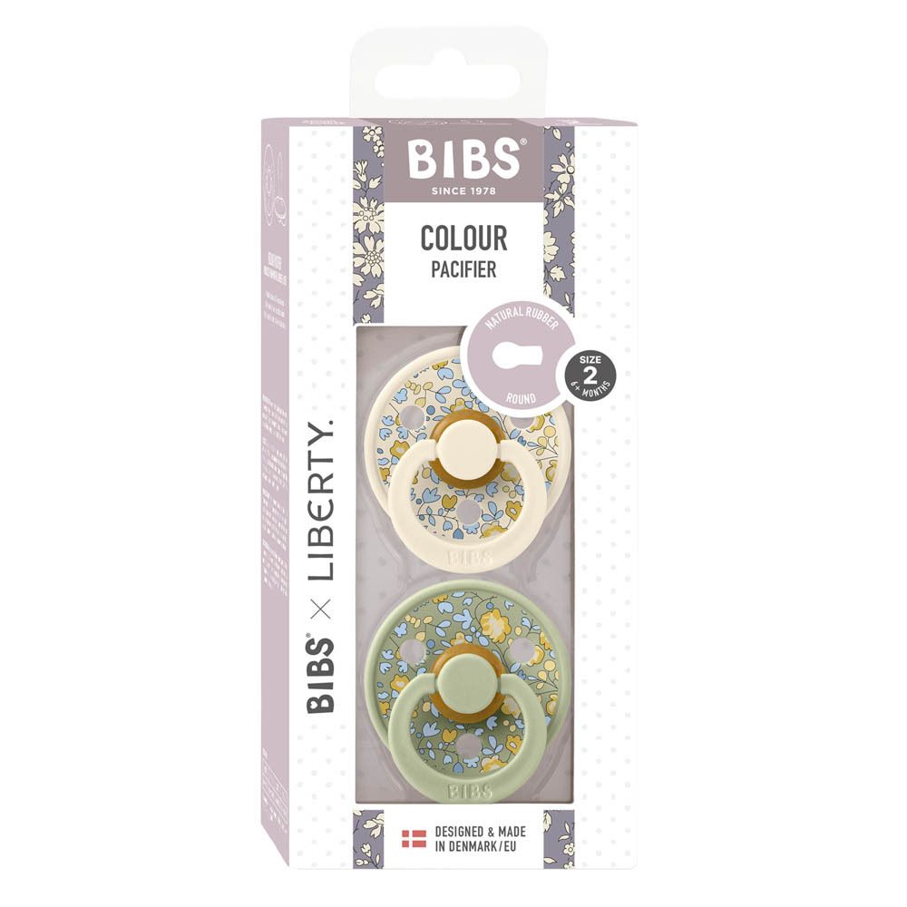 Deux sucettes dans un emballage. BIBS x Liberty. Taille 2. Caoutchouc naturel. Motifs floraux. Fabriqué au Danemark.