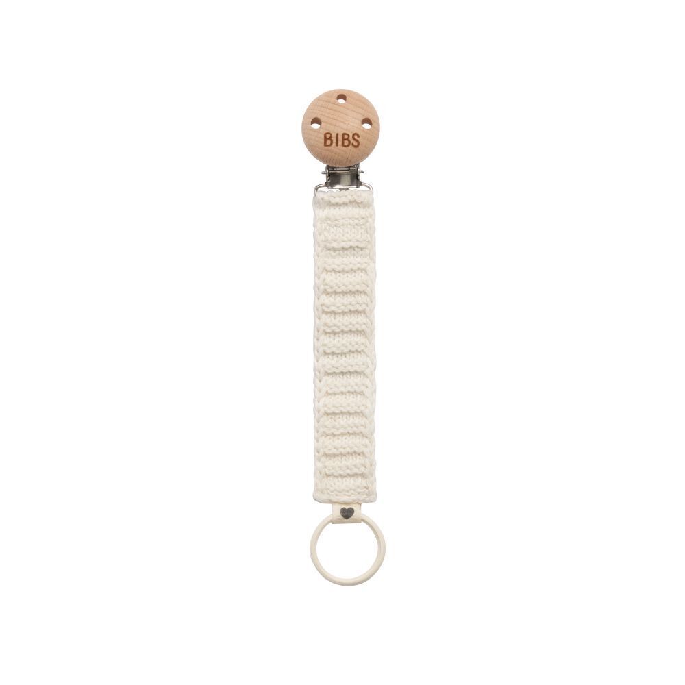 Attache-tétine ivoire avec clip en bois et anneau. Bande tricotée. Marque BIBS.