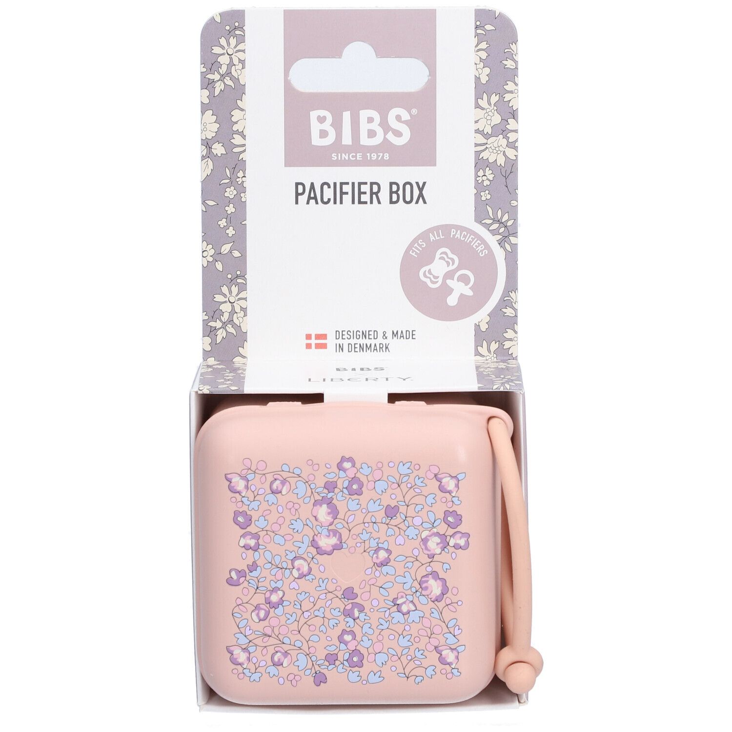 BIBS Schnullerbox Liberty Blush. Rosa Box mit Blumenmuster, in Verpackung. Mit Griff. "PACIFIER BOX" und Logo.