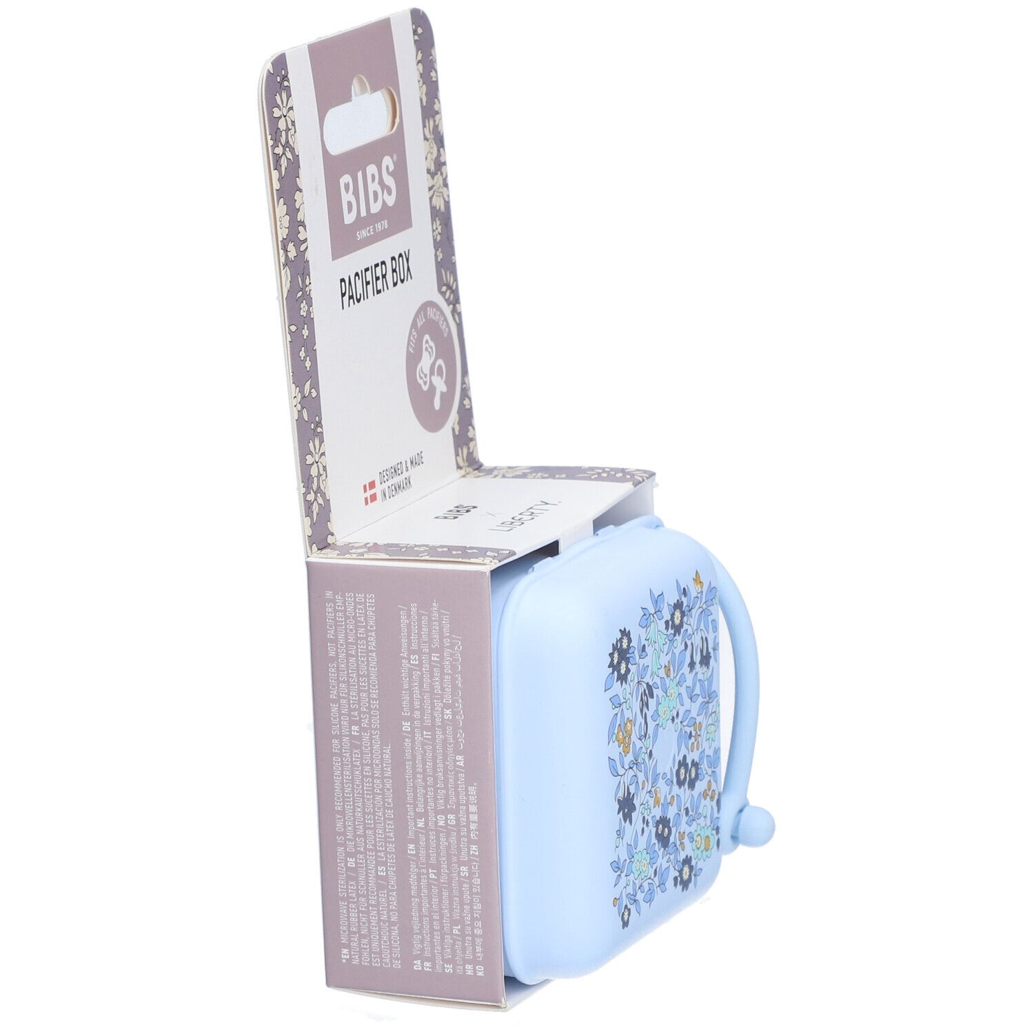 BIBS Schnullerbox Liberty Blue. Hellblaue Box mit Blumenmuster. Verpackung teilweise geöffnet.