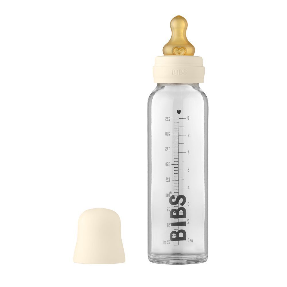 Biberon en verre BIBS ivoire, tétine et bouchon. Graduation en ml. Logo BIBS.