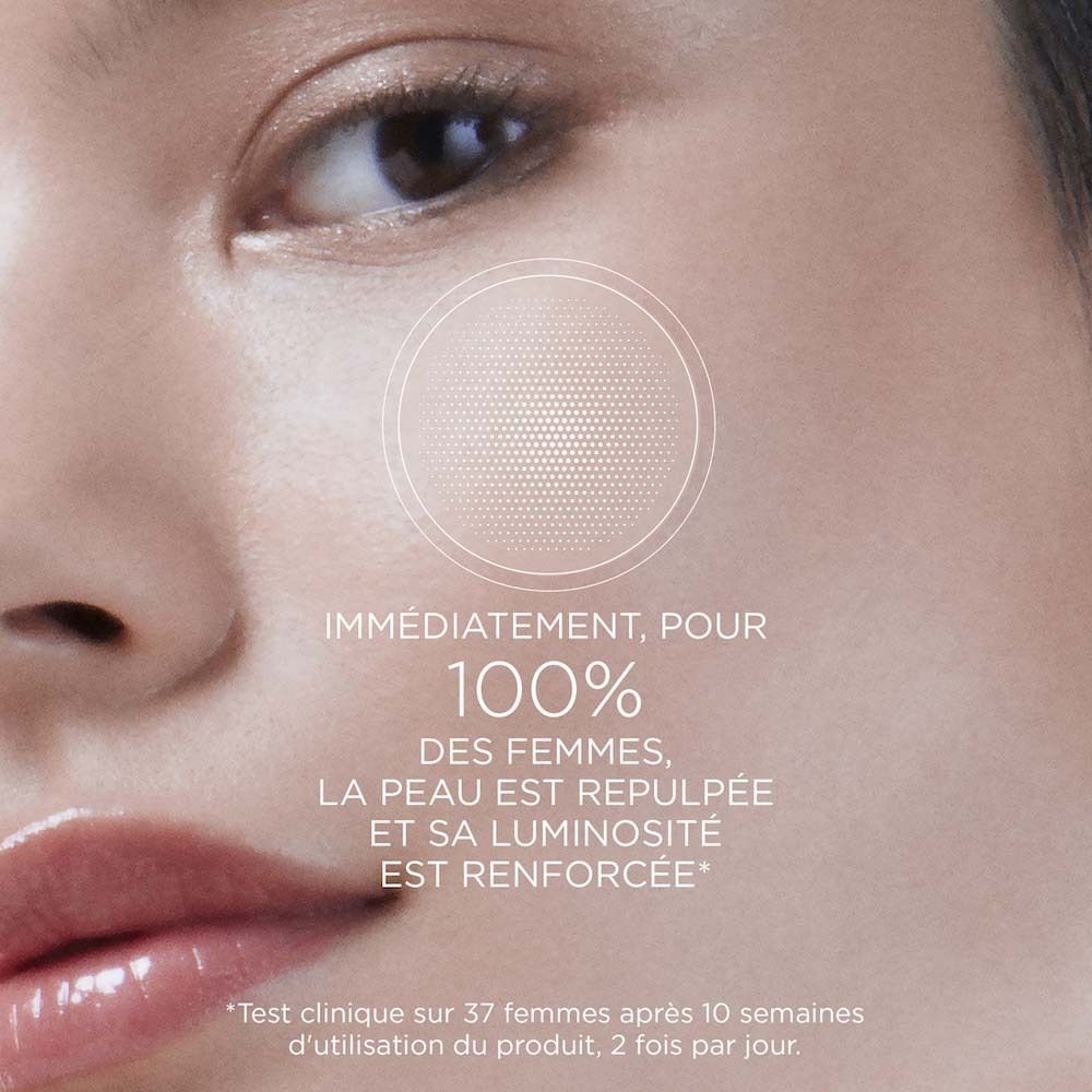 Gesicht mit Text: Sofort, für 100% der Frauen, die Haut ist praller und ihre Leuchtkraft wird verstärkt.