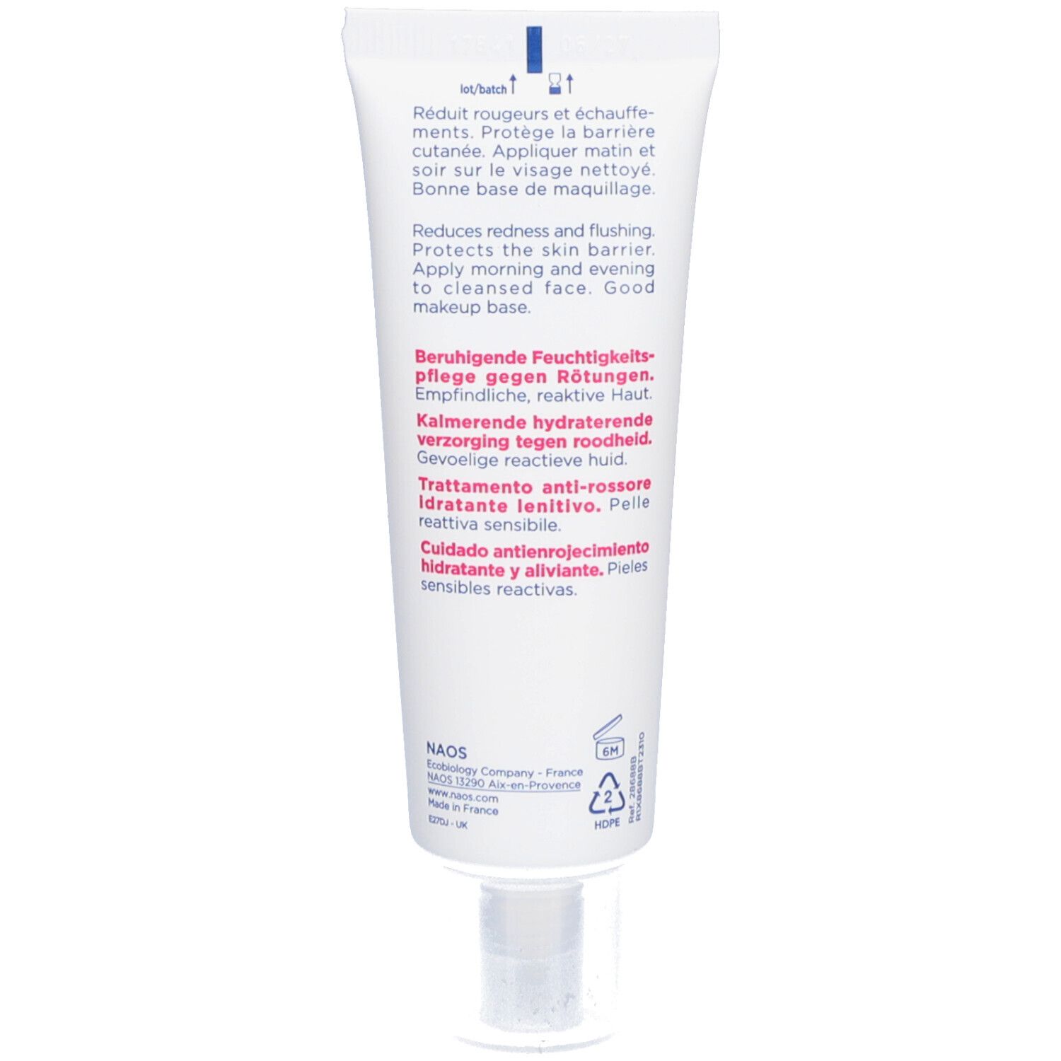 Dos du tube de crème. Texte multilingue. Tube blanc, bouchon blanc.