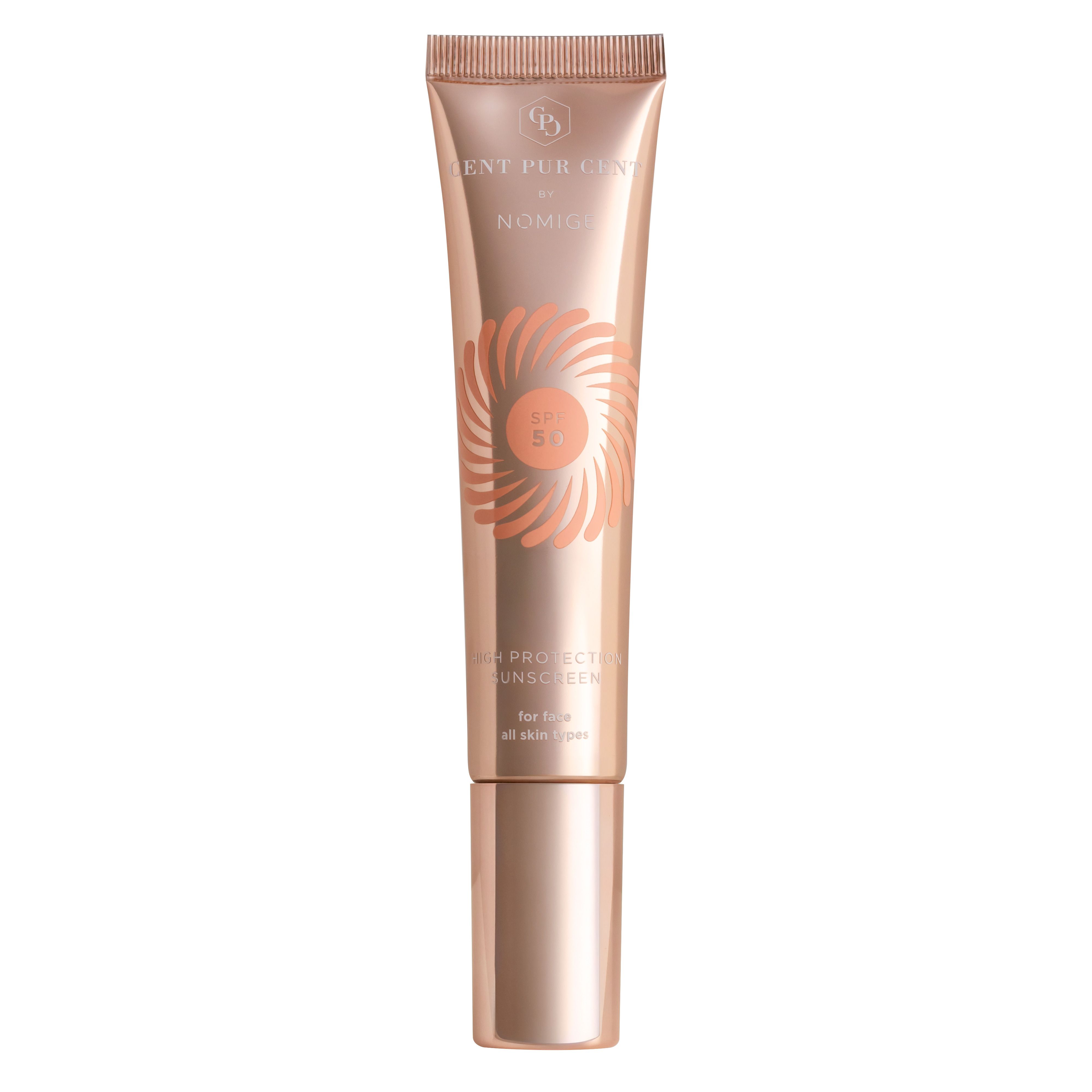 Tube beige et rose doré. Inscription SPF 50. Nom du produit non visible.