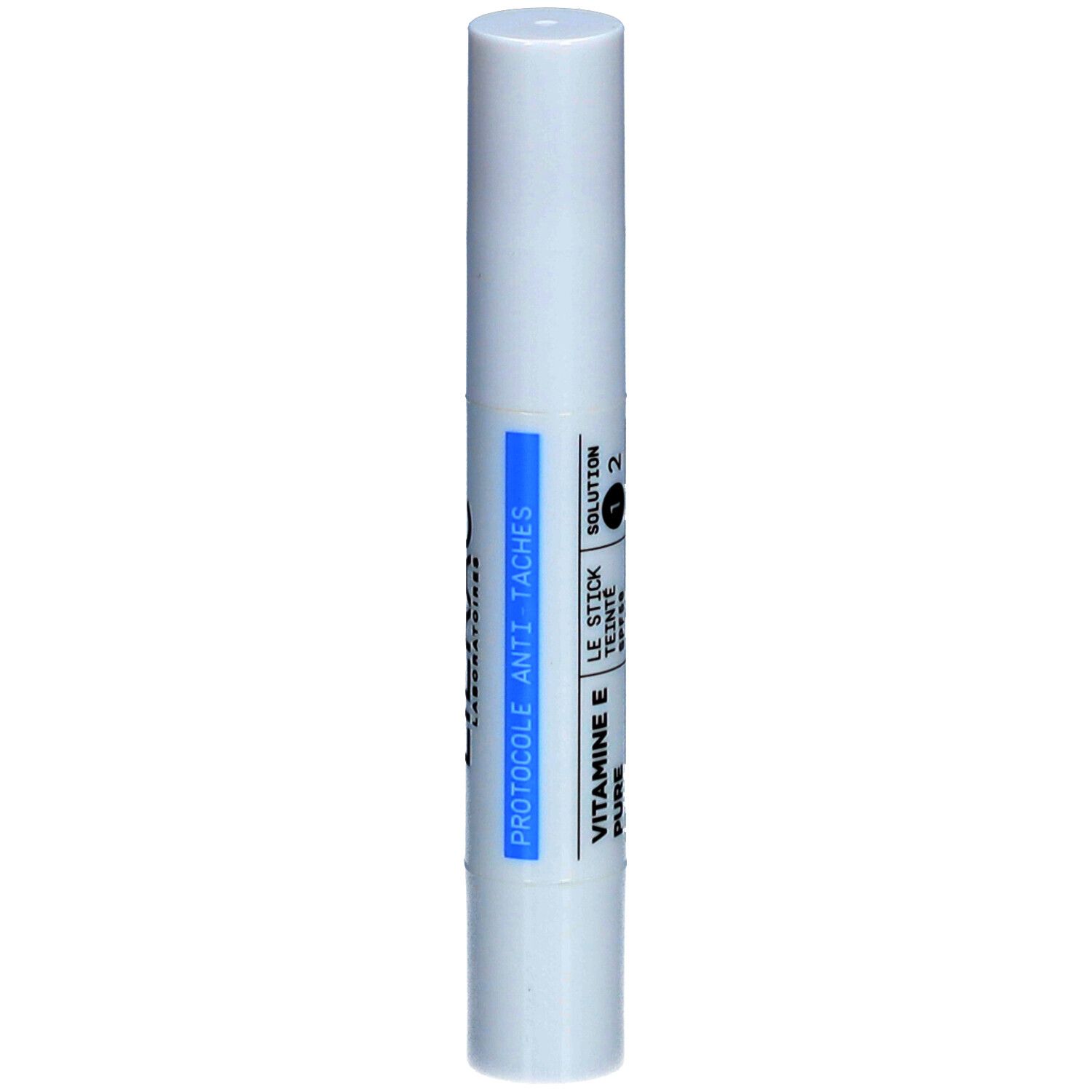 Stick blanc avec inscription bleue : Lierac. Inscription : Protocole Anti-Taches, Vitamine E, Le Stick, Made in France.
