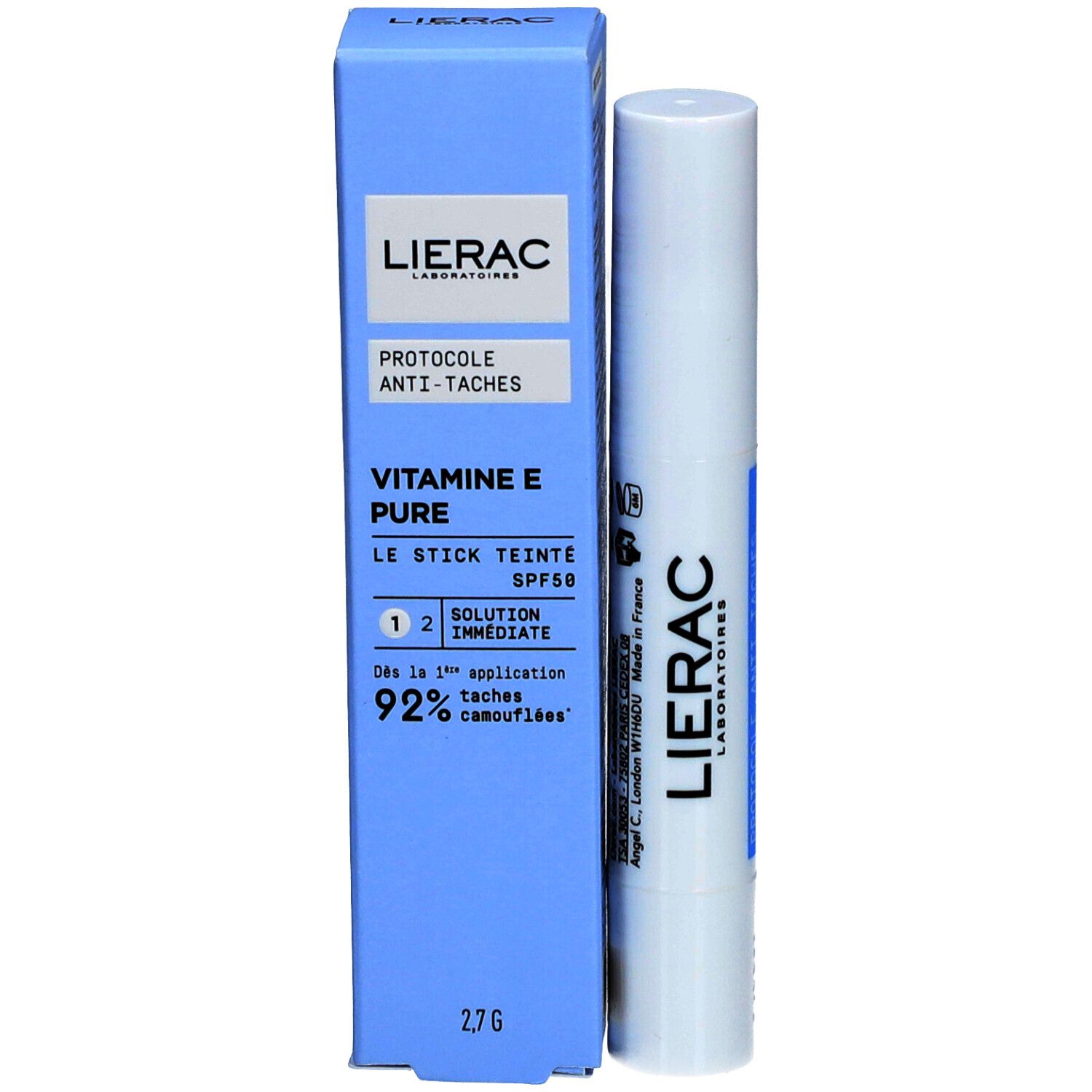 Emballage et stick. Boîte bleue avec texte blanc : Lierac, Protocole Anti-Taches, Vitamine E, Le Stick Teinté SPF50.