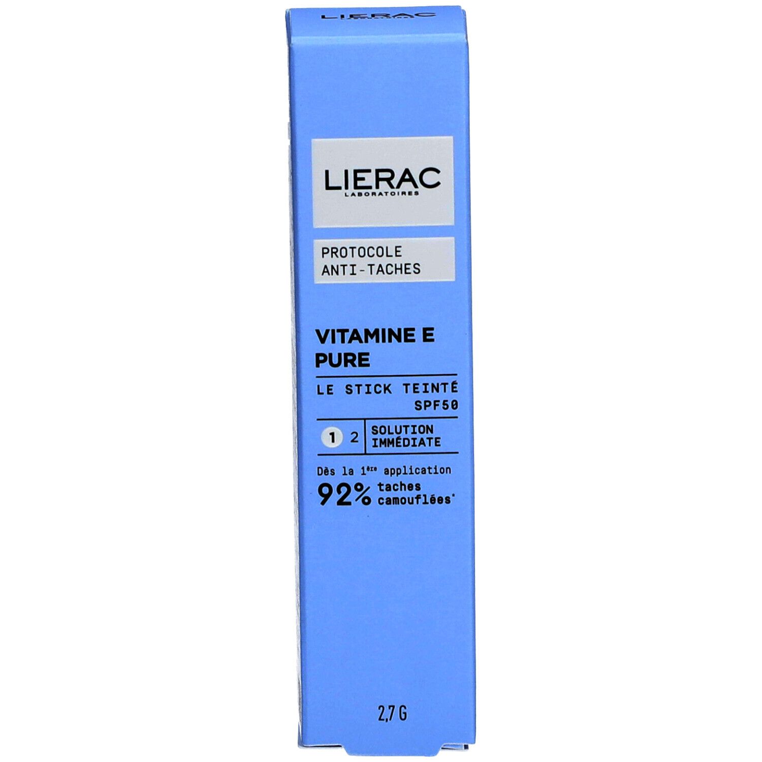 Emballage bleu. Texte blanc : Lierac, Protocole Anti-Taches, Vitamine E Pure, Le Stick Teinté SPF50, 2,7g.