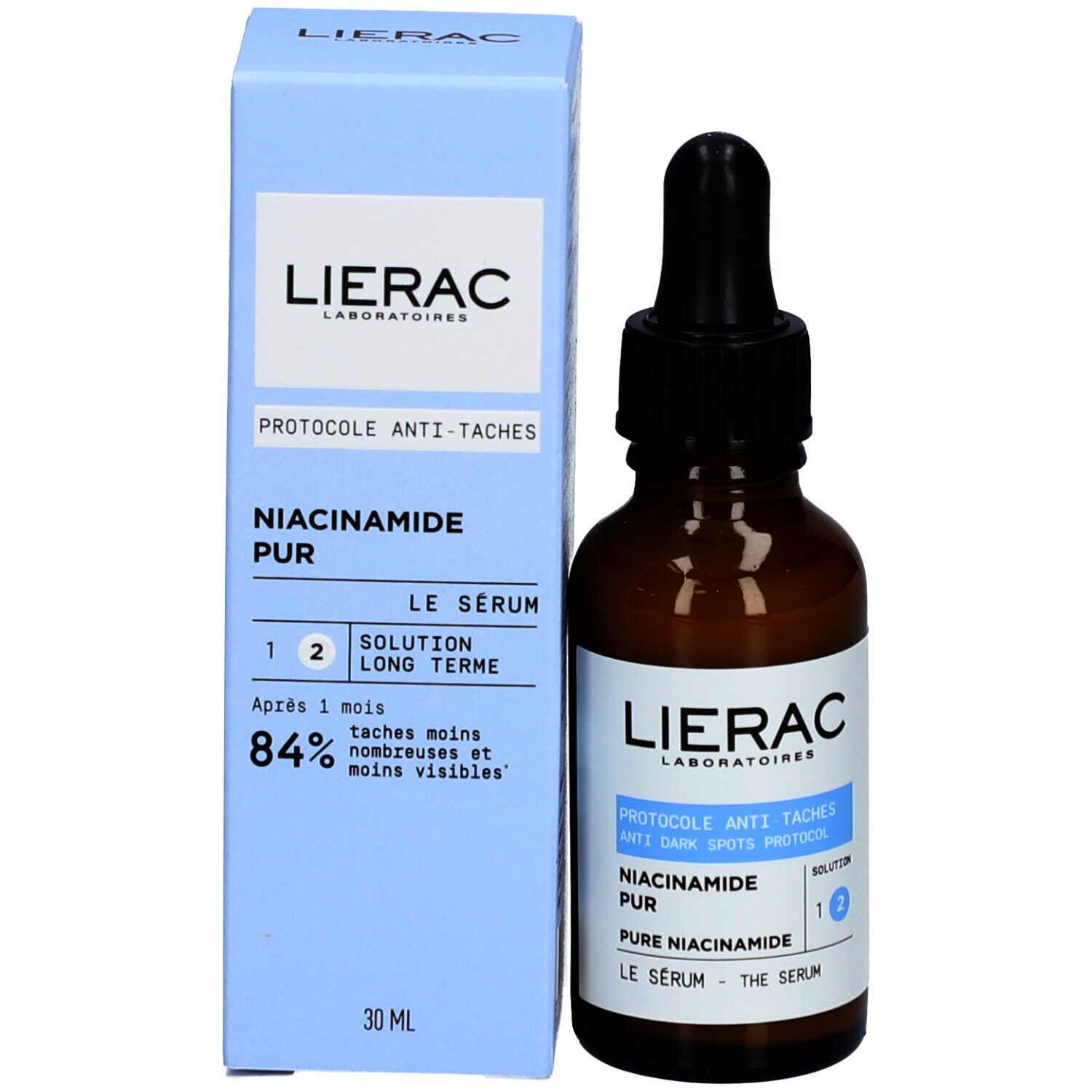 Flacon et emballage. Flacon avec pipette, emballage bleu clair. Marque : Lierac.