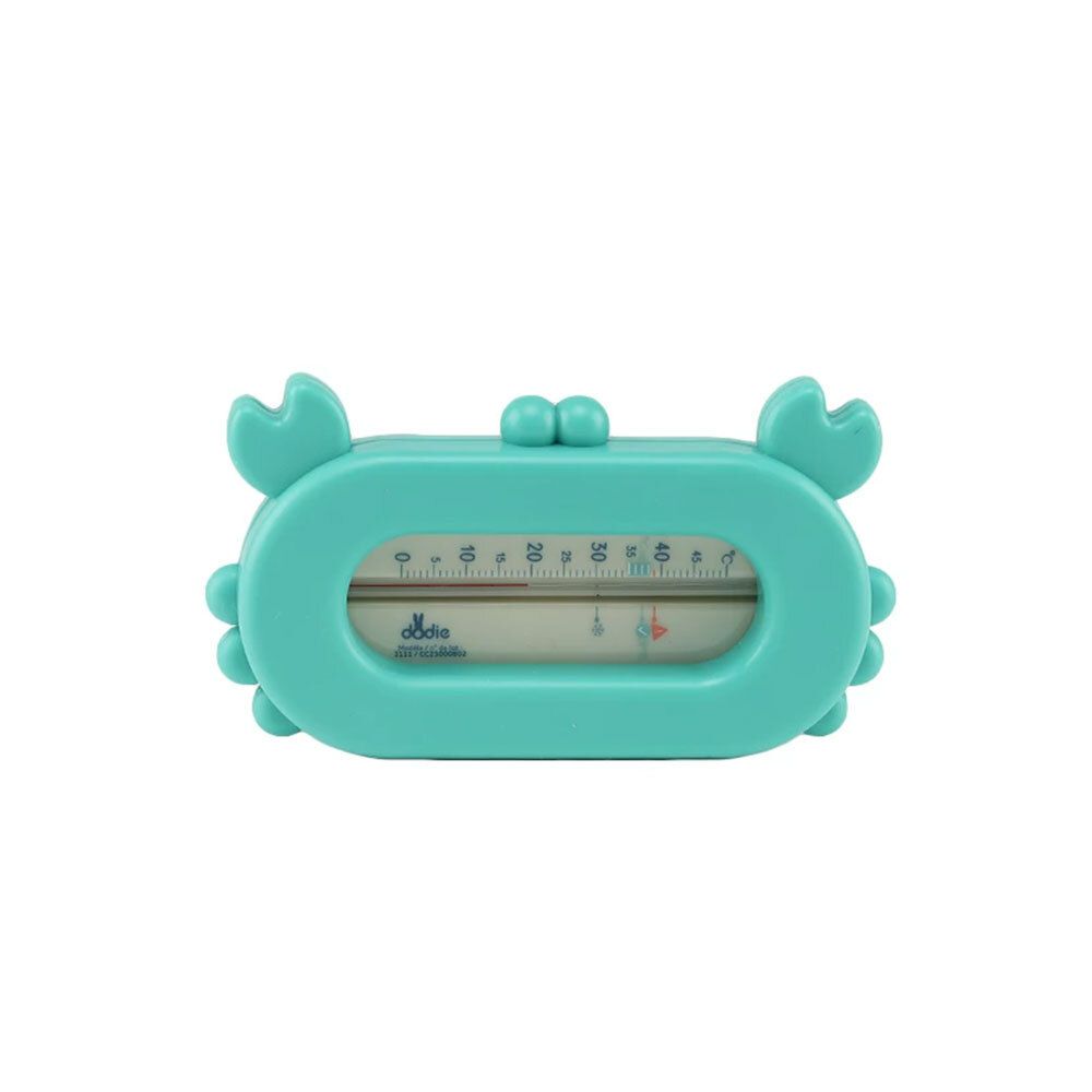 Thermomètre de bain Dodie Krabbe turquoise. En forme de crabe avec affichage de la température. Échelle visible.