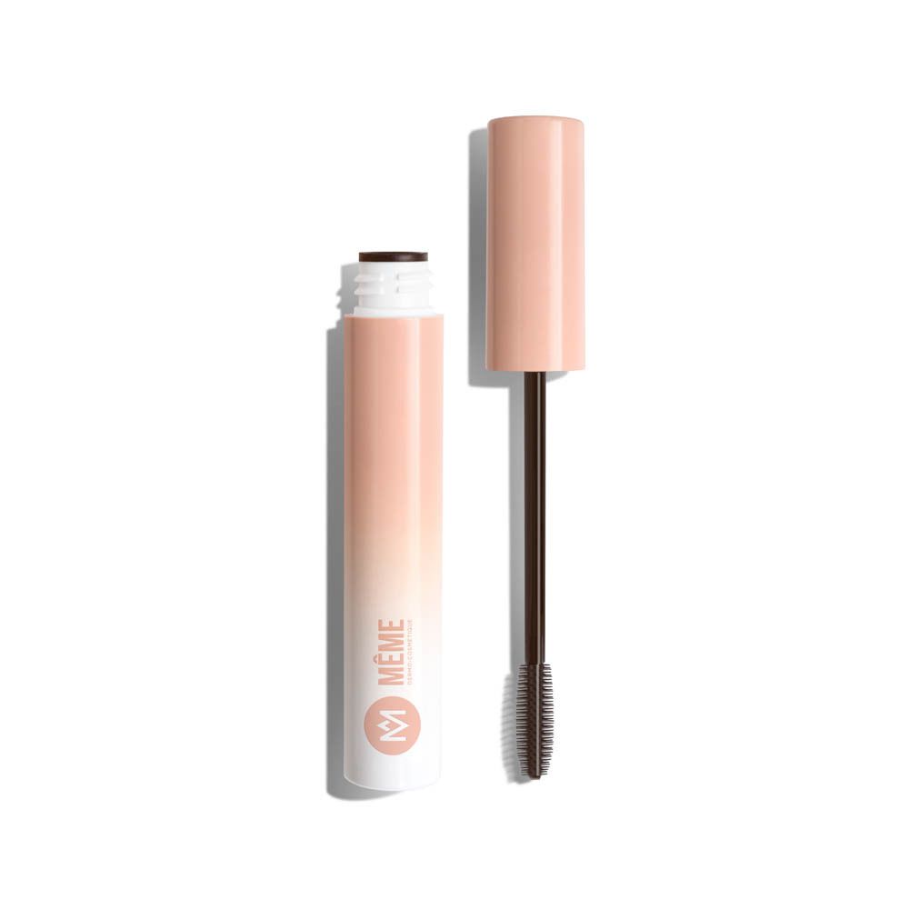 Tube de mascara ouvert avec brosse. Dégradé pêche et blanc. Marque : MÊME.