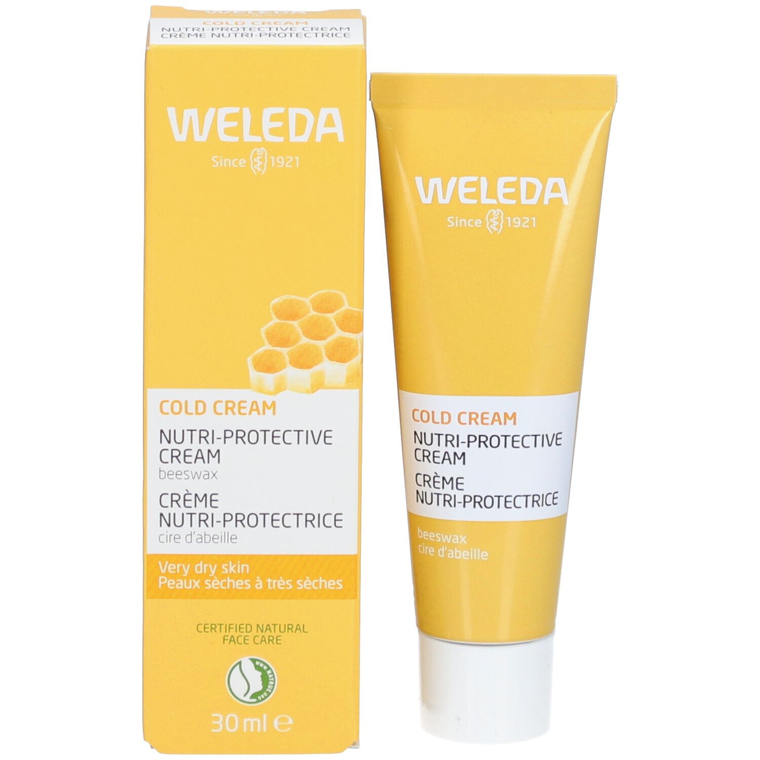 Gelbe Schachtel und Tube. Aufschrift: WELEDA, Cold Cream, Nutri-Protective Cream, Crème Nutri-Protectrice. Mit Bienenwaben-Symbol und 30ml.