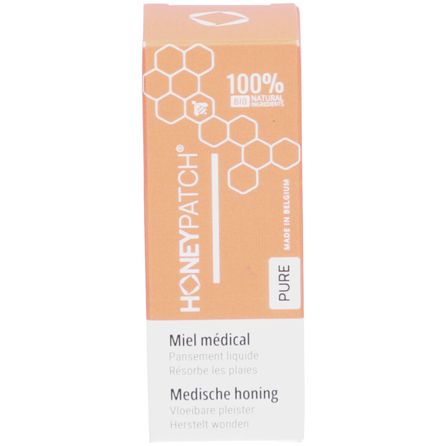 Karton mit HONEYPATCH-Logo, Text und 100% natural ingredients. Orangefarbenes Design.