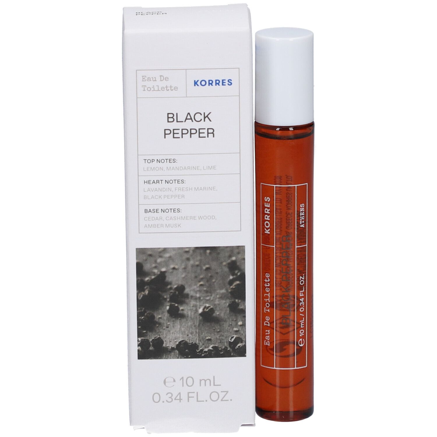 Bruine glazen fles met witte dop en doos. Op de doos staat "Black Pepper" en "Korres".