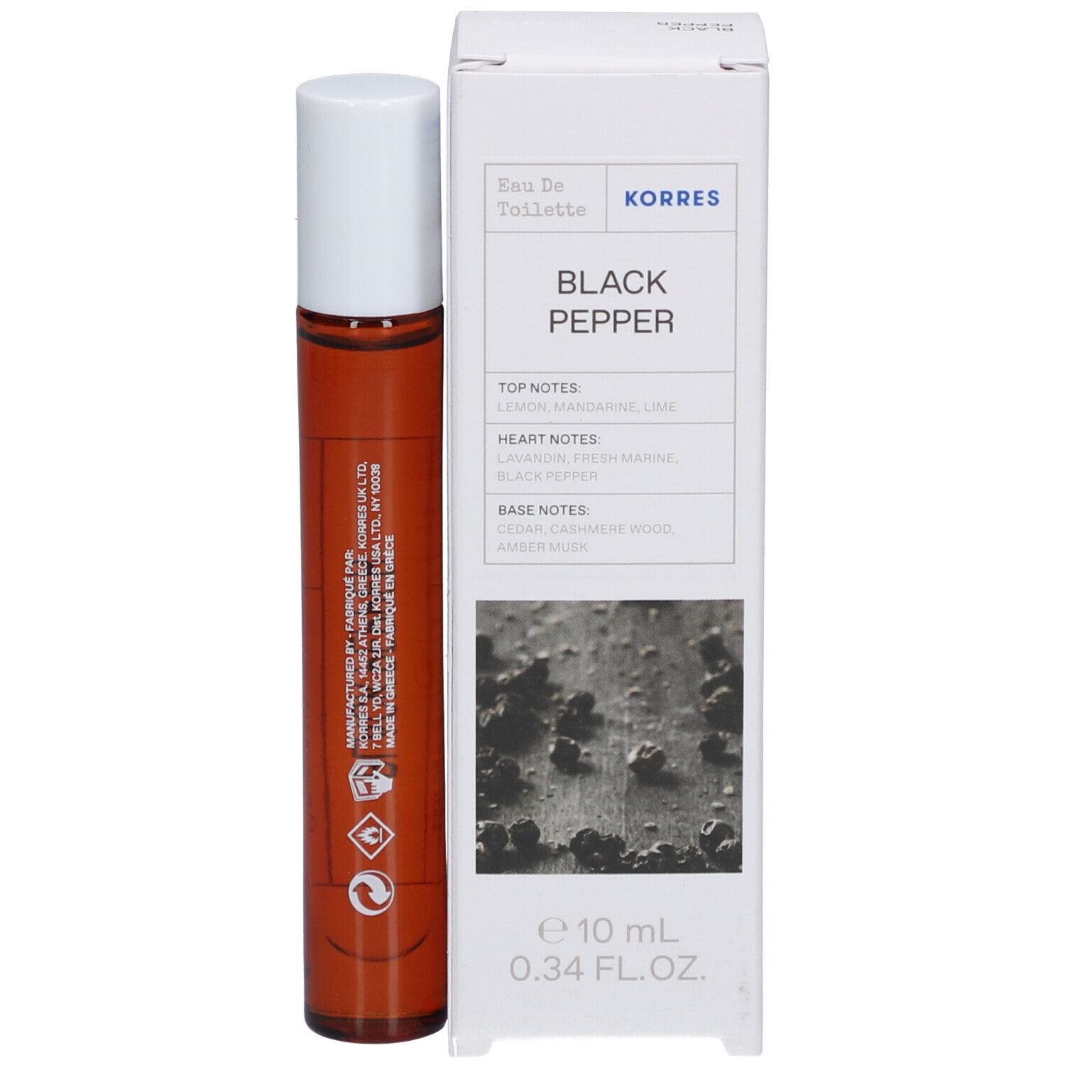 Bruine glazen fles met witte dop en doos. Op de doos staat "Black Pepper" en "Korres".