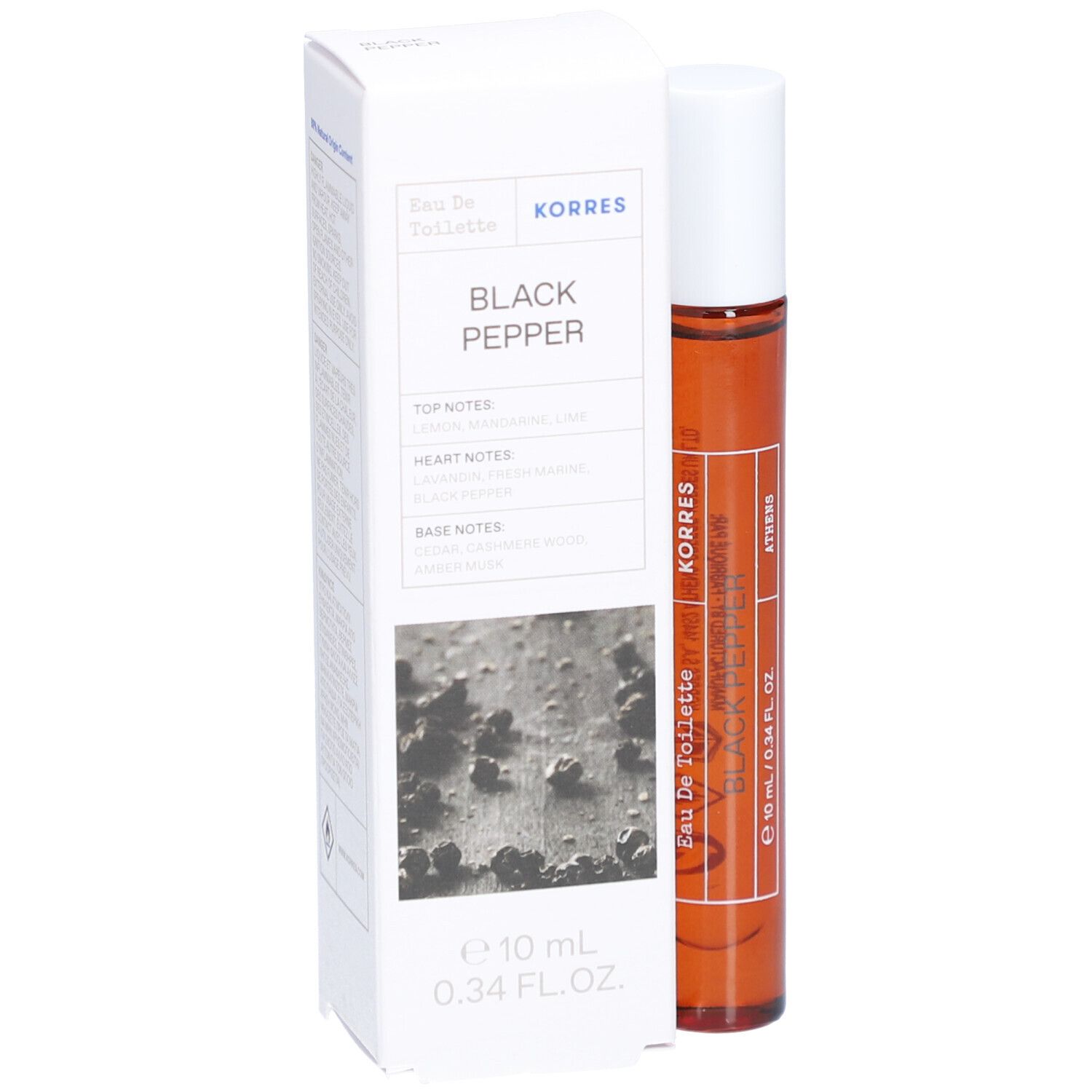 Bruine glazen fles met witte dop en doos. Op de doos staat "Black Pepper" en "Korres".