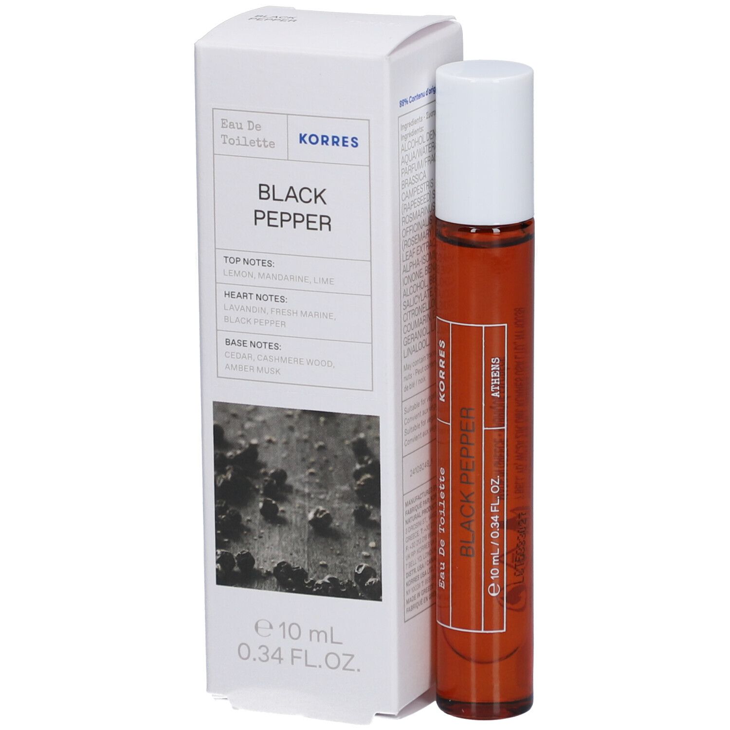 Bruine glazen fles met witte dop en doos. Op de doos staat "Black Pepper" en "Korres".