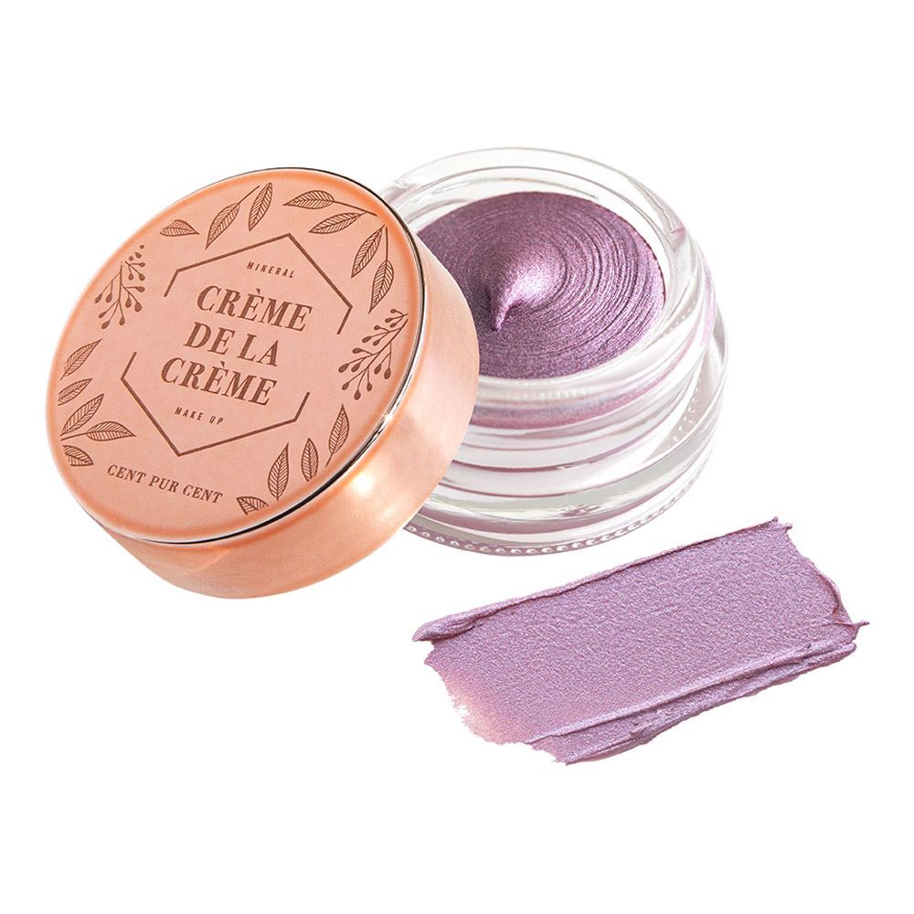 Crème lila dans un pot en verre avec un couvercle en or rose. À côté, un échantillon de couleur de la crème.