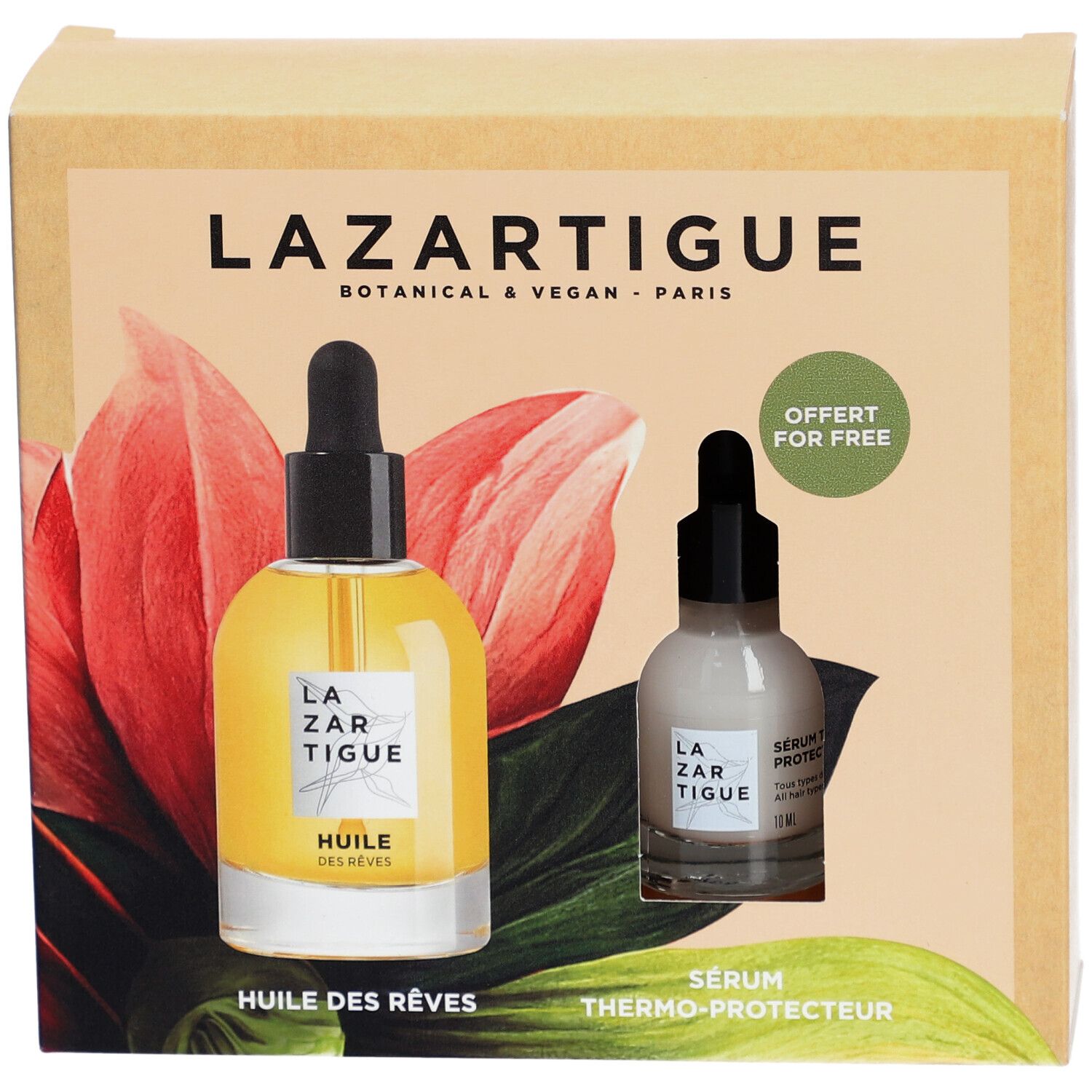 Coffret avec deux flacons. Un avec liquide jaune, l'autre avec liquide blanc. Texte: Lazartigue, Huile des Rêves, Sérum Thermo-Protecteur.