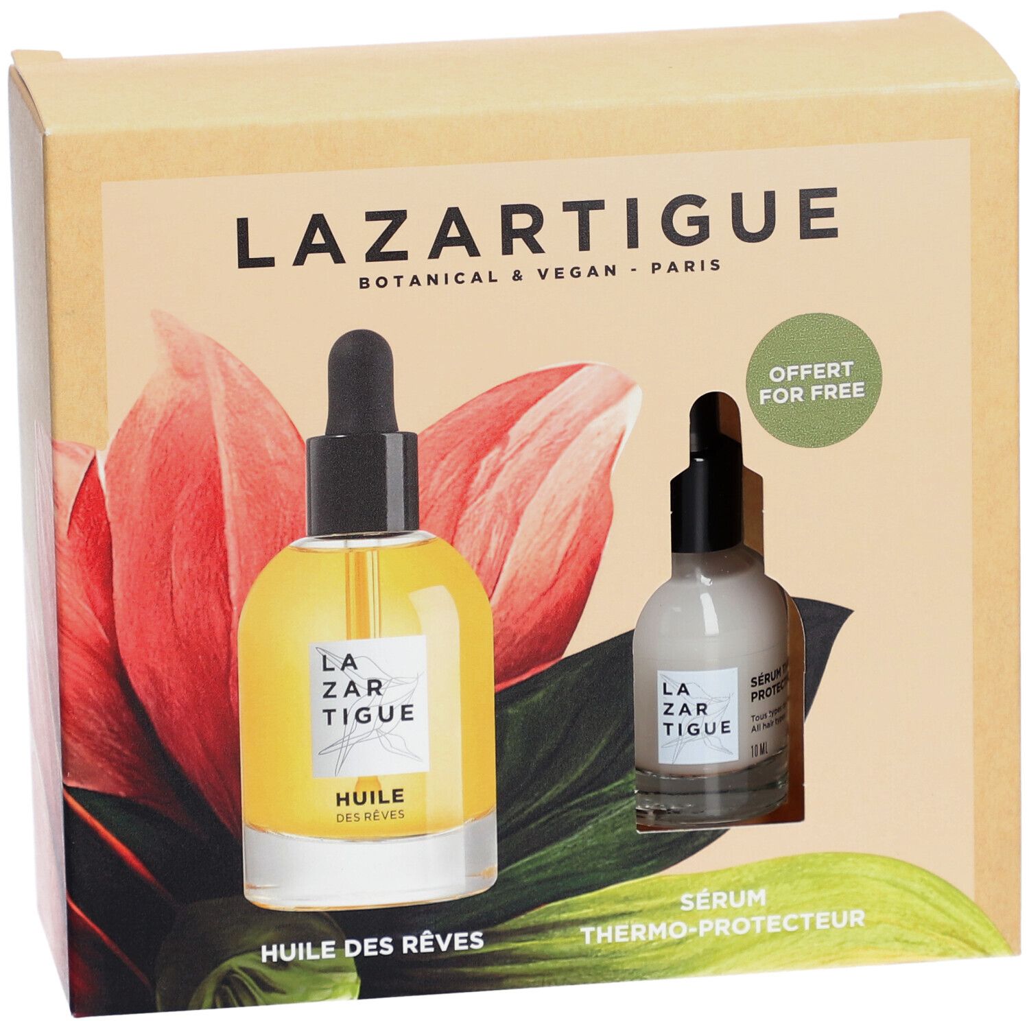Coffret avec deux flacons. Un avec liquide jaune, l'autre avec liquide blanc. Texte: Lazartigue, Huile des Rêves, Sérum Thermo-Protecteur.