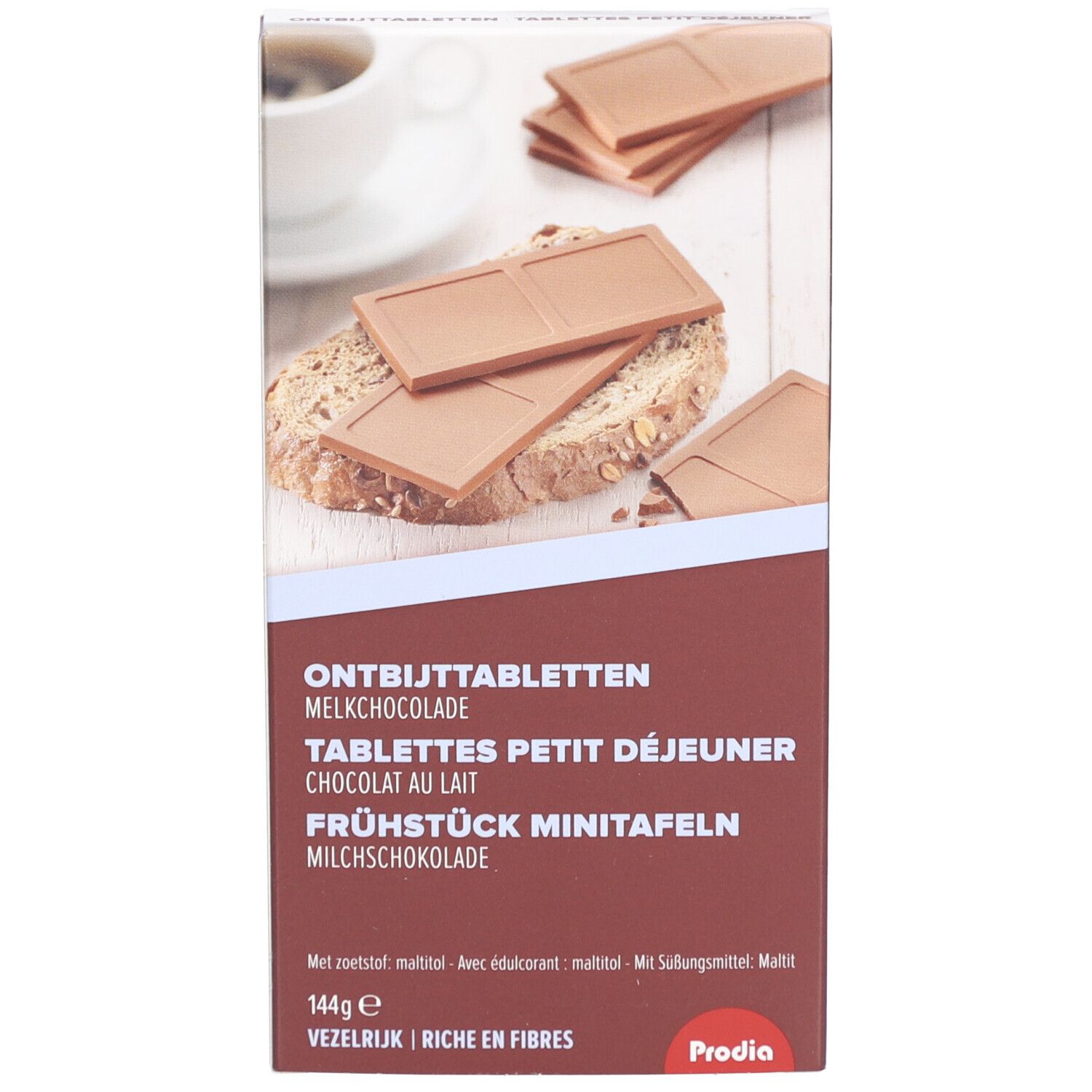 Prodia Frühstückstafel Milchschokolade: Drei Tafeln auf Brot mit einer Tasse Kaffee.