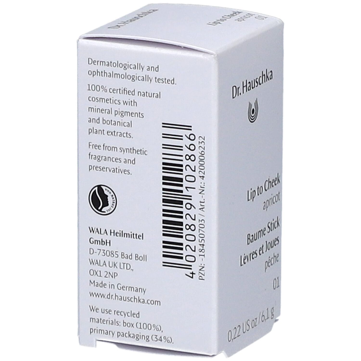 Weiße Verpackung, Rückseite mit Informationen. Marke: Dr. Hauschka. Text: 100% natürliche Kosmetik. Barcode.