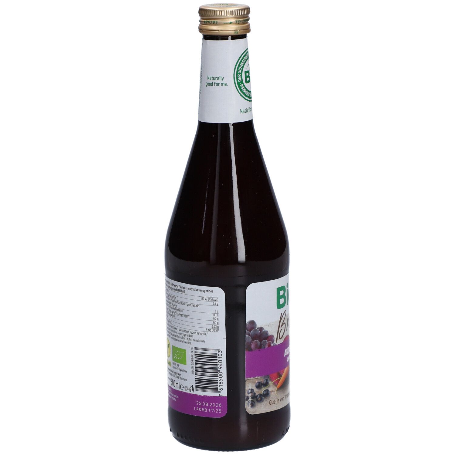 Dos d'une bouteille en verre de jus foncé. Étiquette avec informations nutritionnelles, liste des ingrédients et code-barres.
