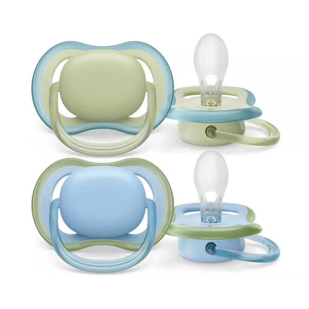 Deux sucettes PHILIPS AVENT Ultra Air. Vert et bleu. De forme orthodontique.