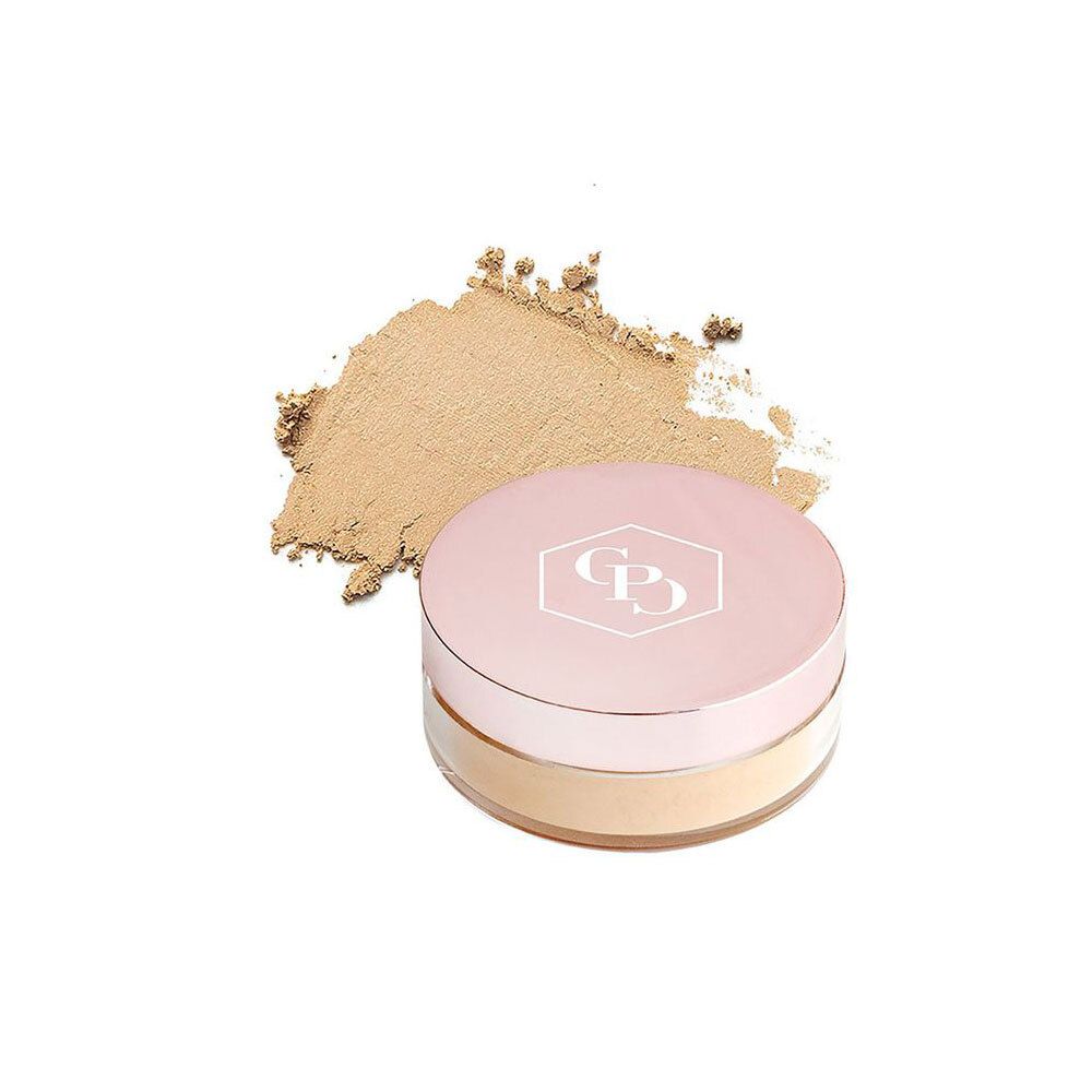 Puderbehälter mit rosa Deckel und Produkt daneben. Marke: Cent Pur Cent. Medium 3.5.