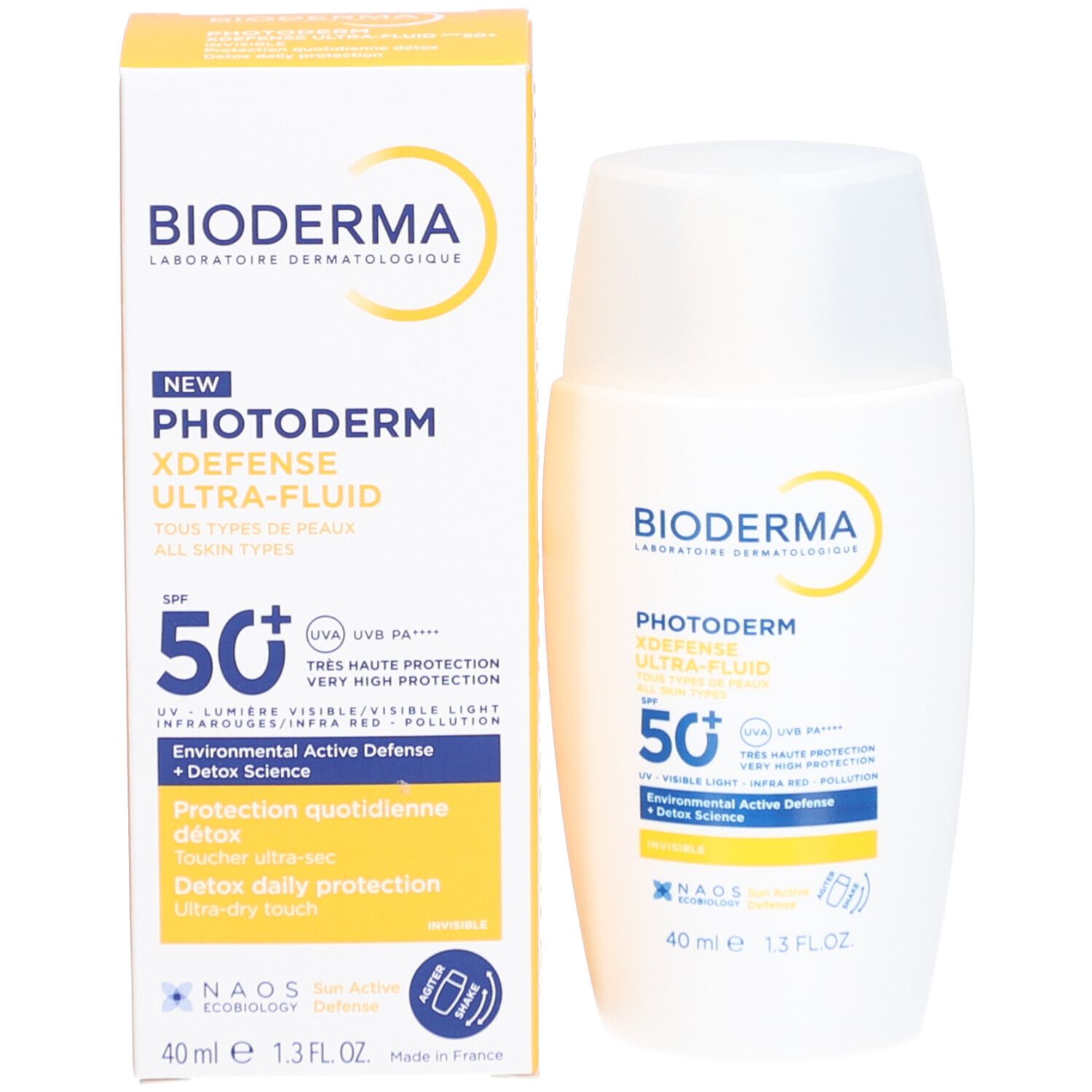 Produkt und Verpackung. Weiße Flasche und gelbe Schachtel. Aufschrift: Bioderma, Photoderm, SPF 50+.
