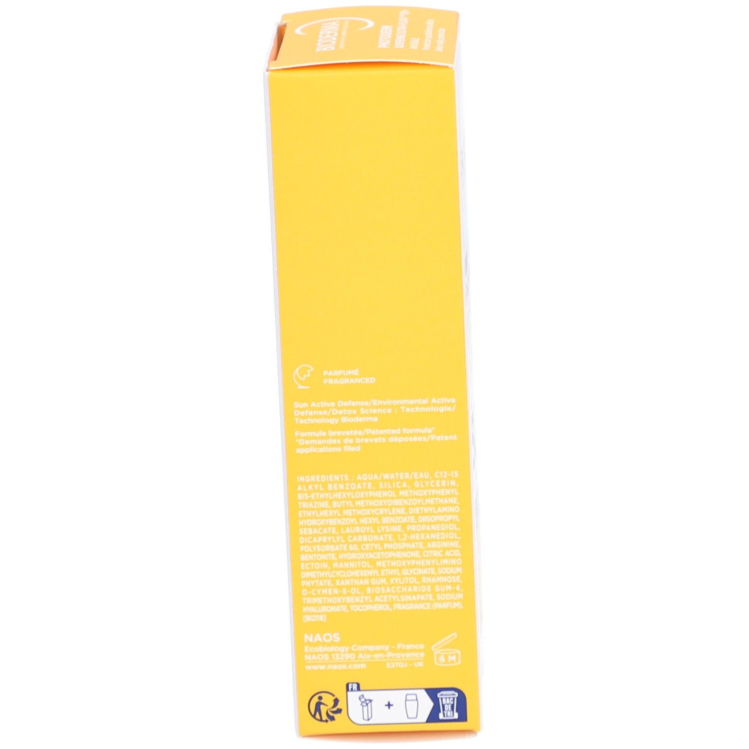 Gelbe Schachtel, Seitenansicht. Text und Logos. Informationen zum Produkt und Hersteller.