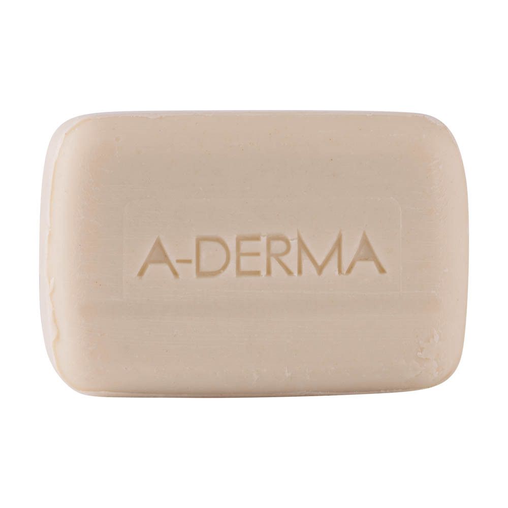 Beige zeep met A-DERMA logo. Rechthoekige vorm. Opschrift: A-DERMA.