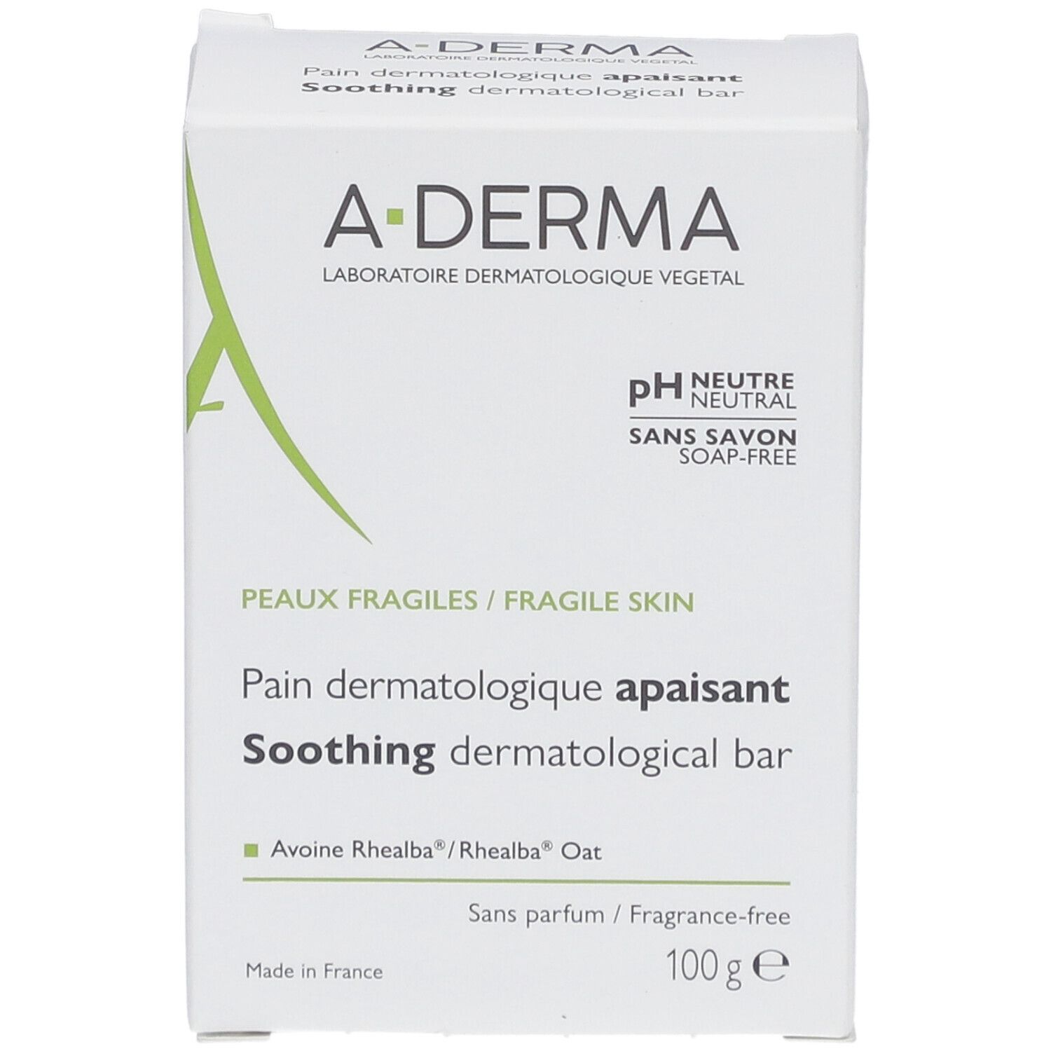 Witte A-DERMA doos. Opschrift: Pain dermatologique apaisant. Bevat 100g. Voor fragiele huid. Zonder parfum, zonder zeep.