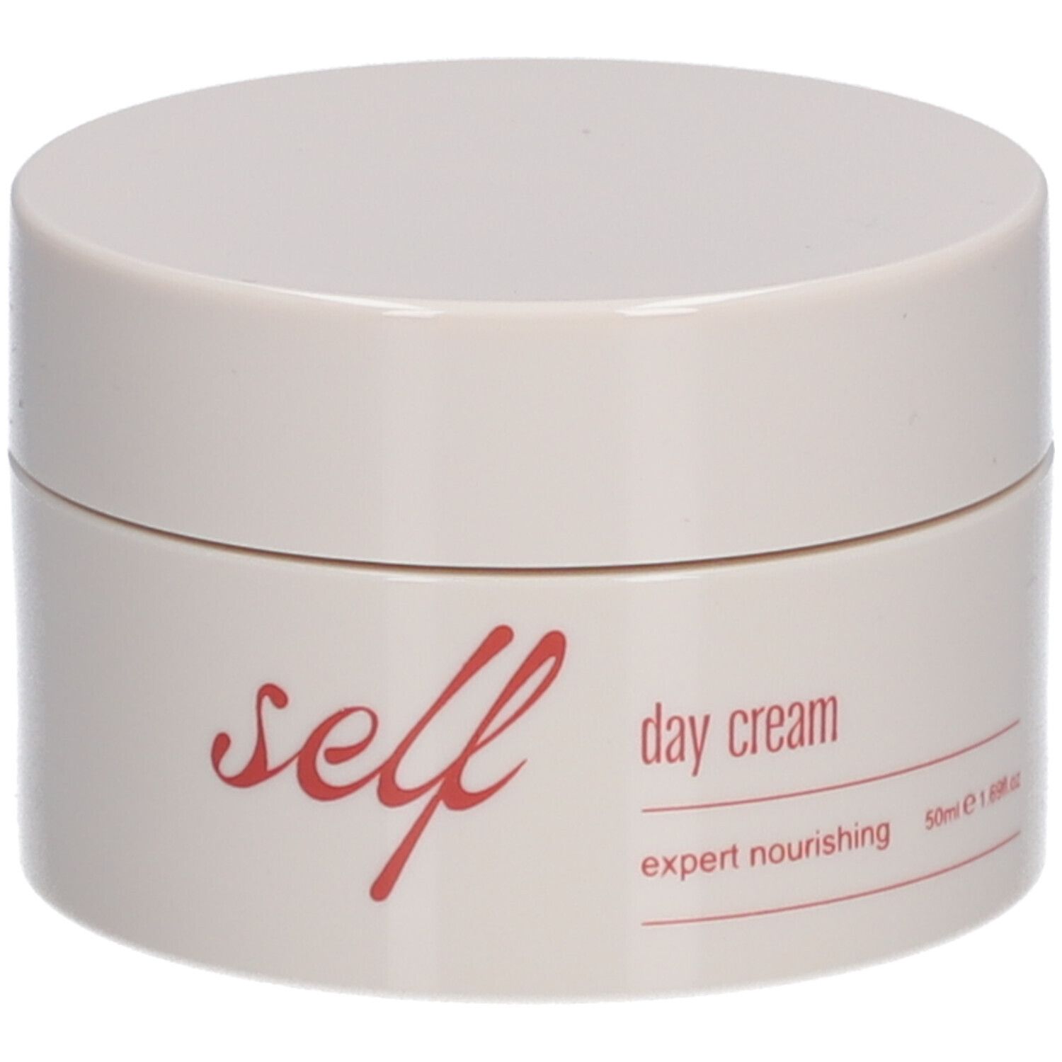 Beige Tiegel mit roter Aufschrift "self day cream". Text: expert nourishing, 50ml.