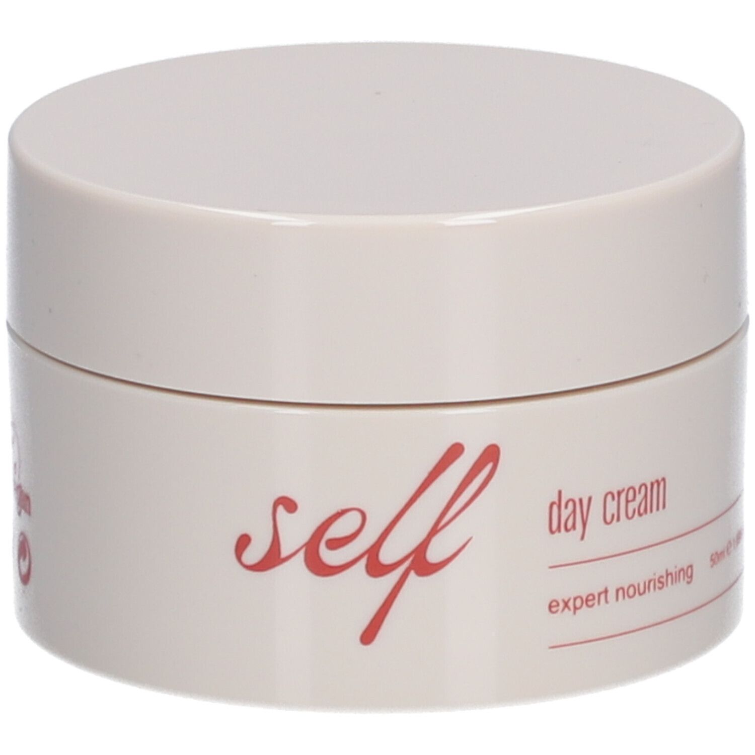 Beige Tiegel mit roter Aufschrift "self day cream". Text: expert nourishing, 50ml.