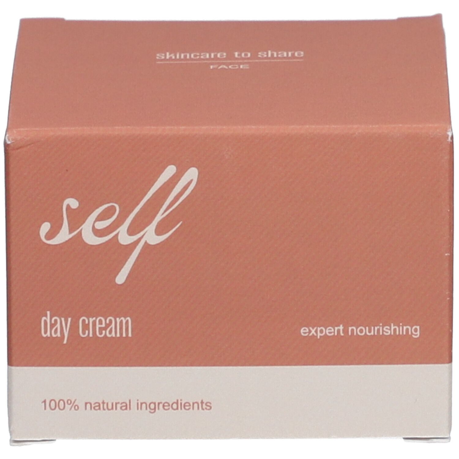 Produktverpackung. Aufschrift: self day cream, expert nourishing, 100% natural ingredients.