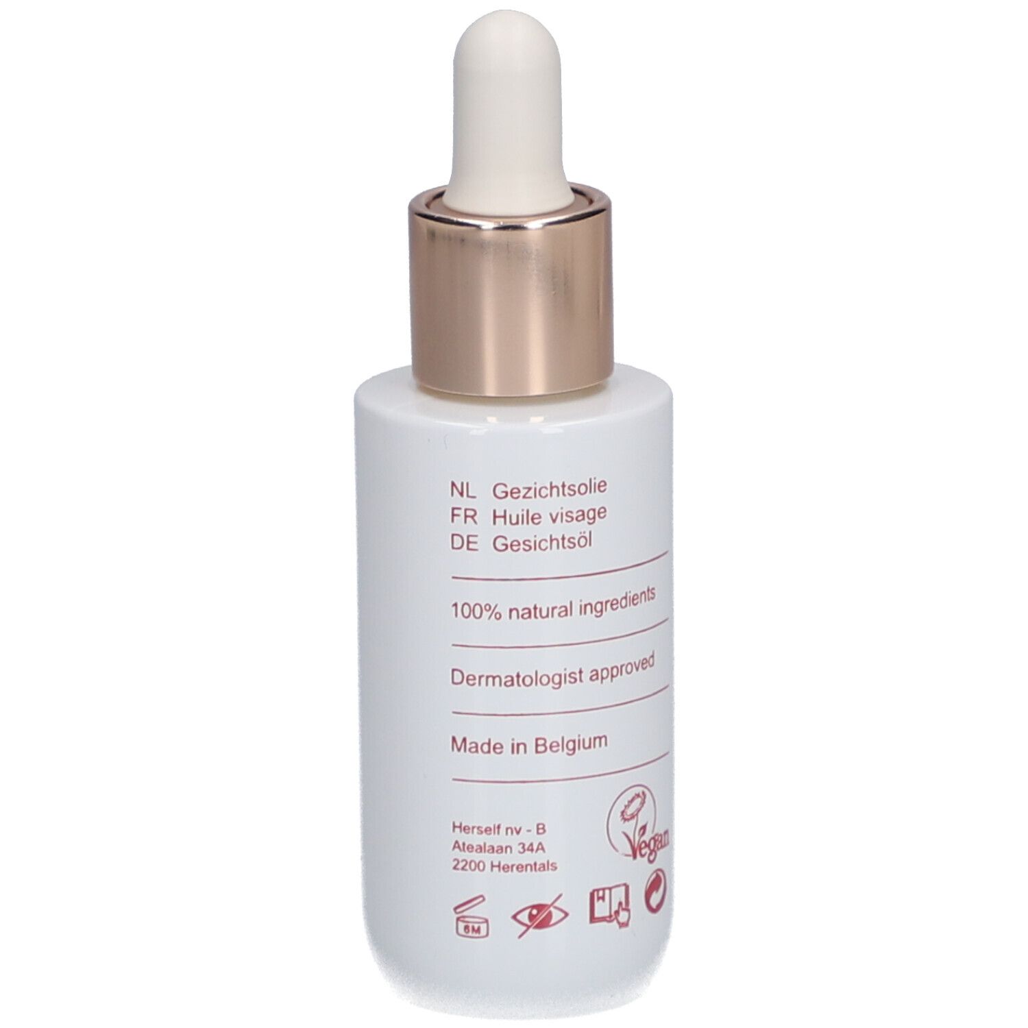 Flacon blanc avec pipette. Texte en néerlandais, français et allemand. Inscription "100% natural ingredients".