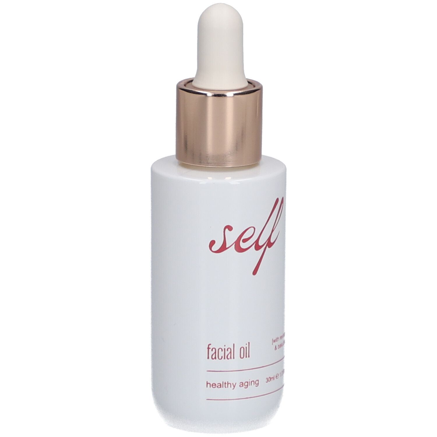 Flacon blanc avec pipette. Inscription "self facial oil healthy aging".