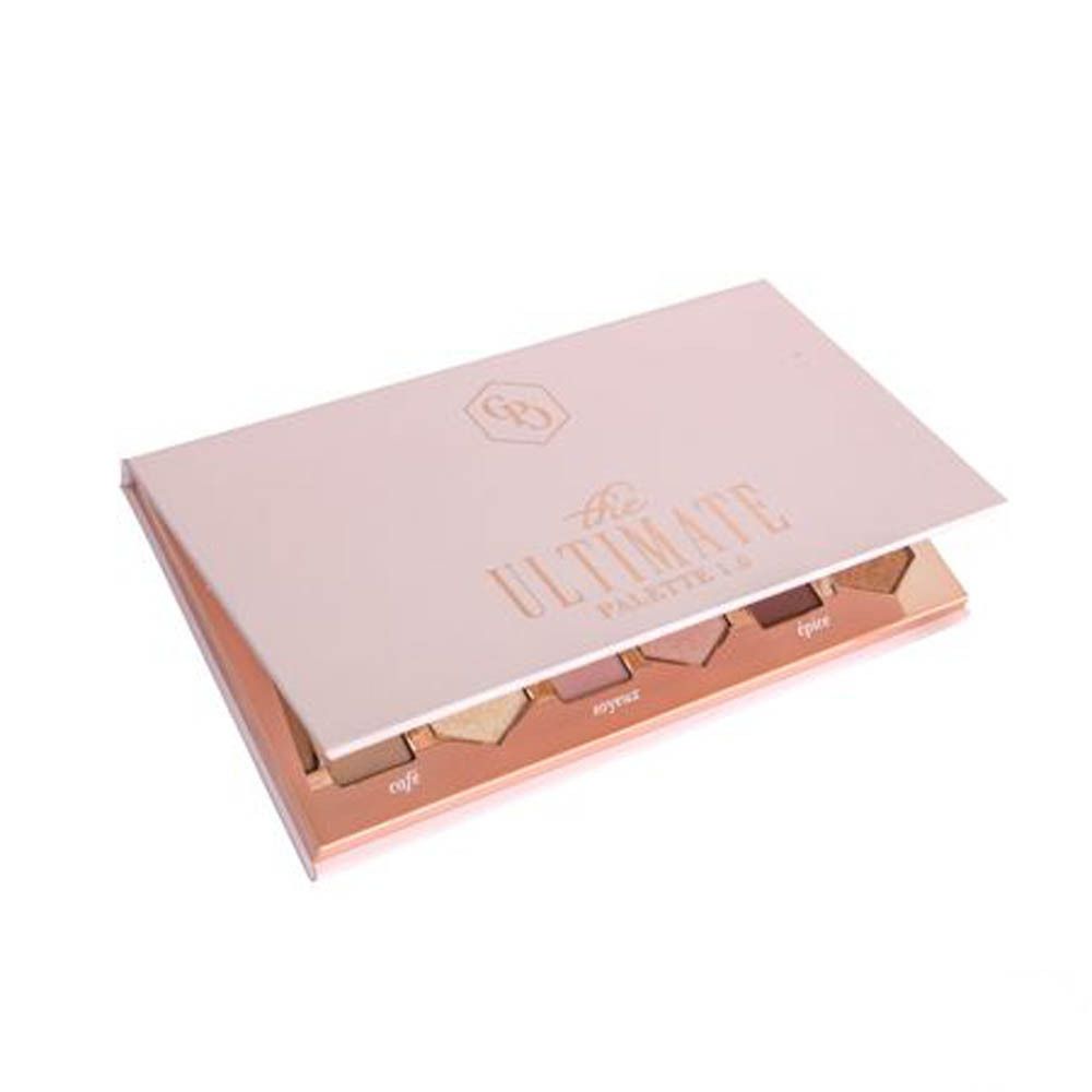 Open roze oogschaduwpalet. Zes tinten zichtbaar. Logo en tekst "The Ultimate Palette 1.0".