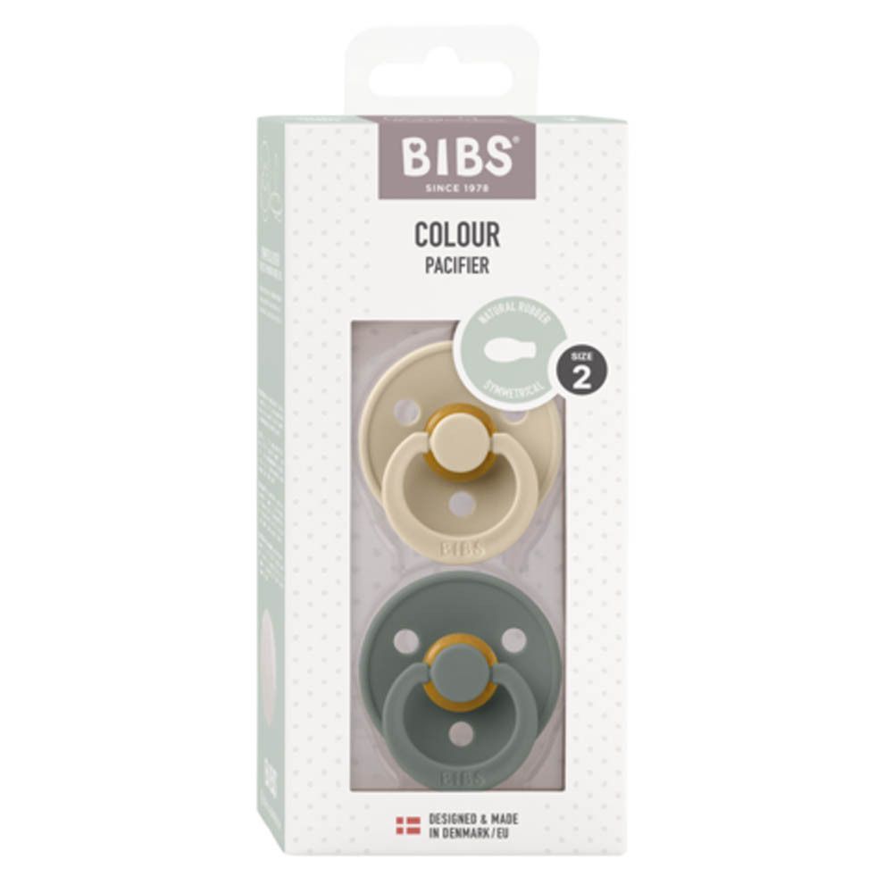 BIBS tétines symétriques, 2 pièces, en emballage. Deux tétines beige et verte. Taille 2. Emballage avec logo BIBS.