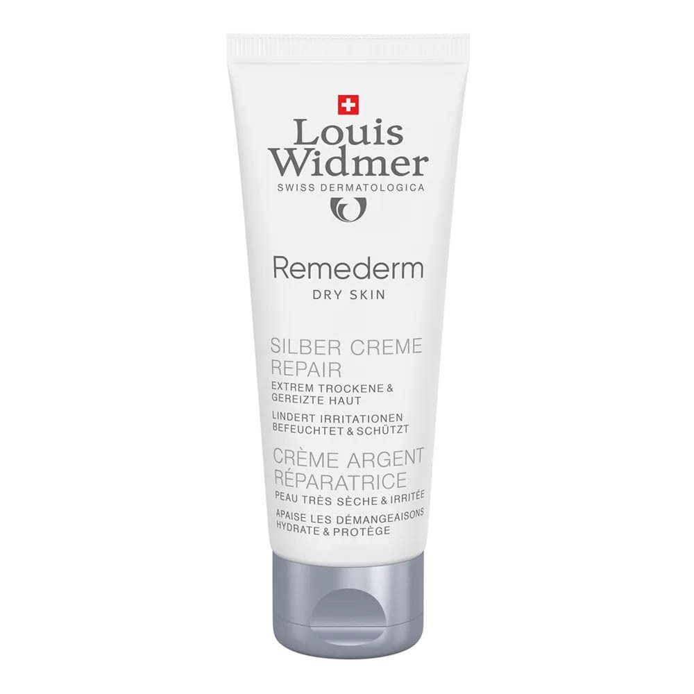 Crèmetube met productnaam en logo. Zilveren dop. Tekst: Zilver Crème Repair, voor droge huid.