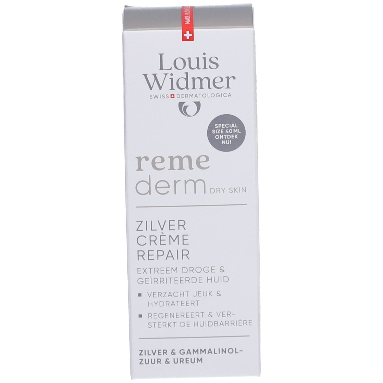 Productverpakking. Wit met productnaam en logo. Tekst: Zilver Crème Repair, voor droge huid.