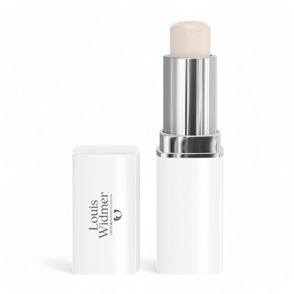 Louis Widmer Hydraderm lippenbalsem. Witte stick, geopend. Merk en logo zichtbaar.