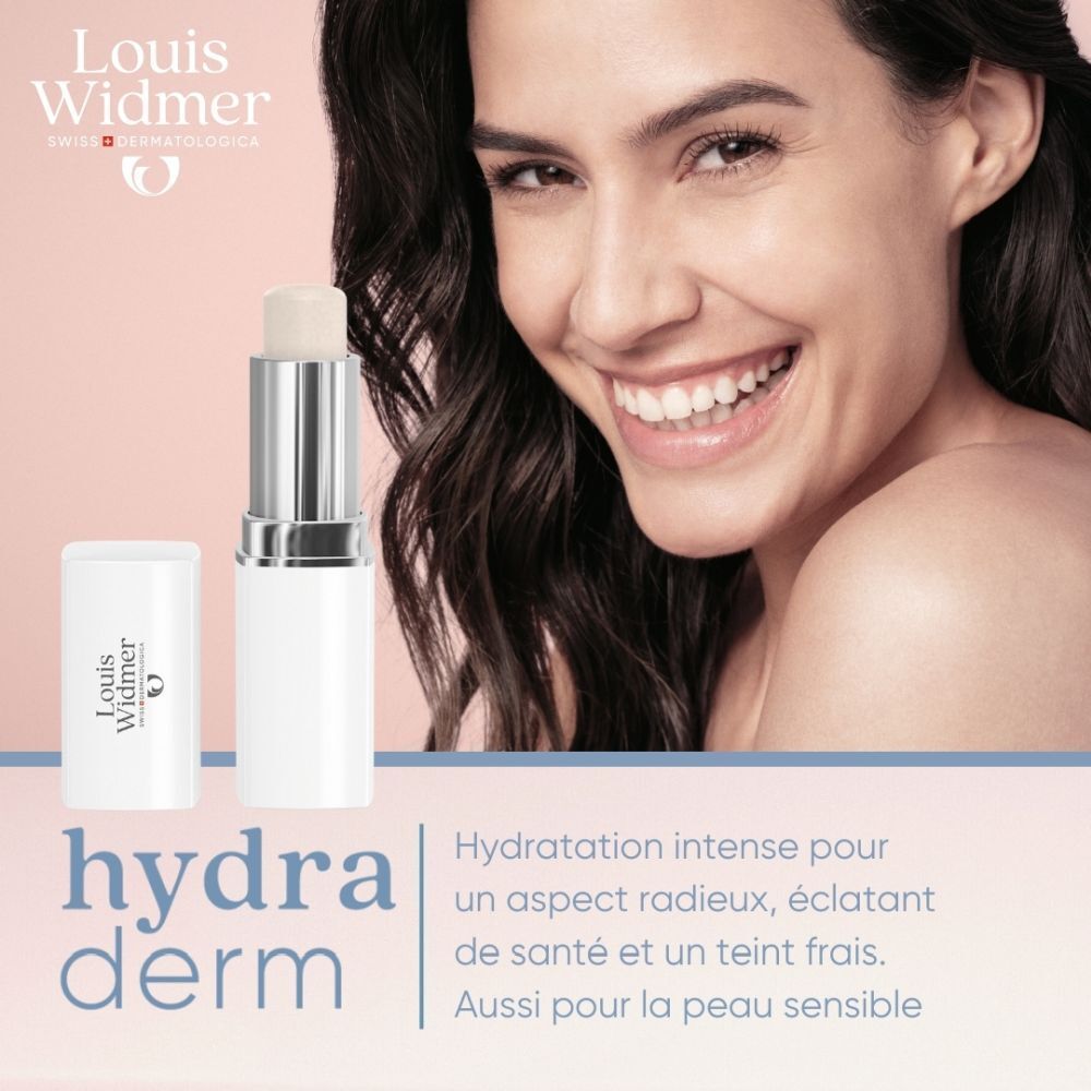 Stick à lèvres Louis Widmer Hydraderm et emballage. Femme souriante. Informations produit.