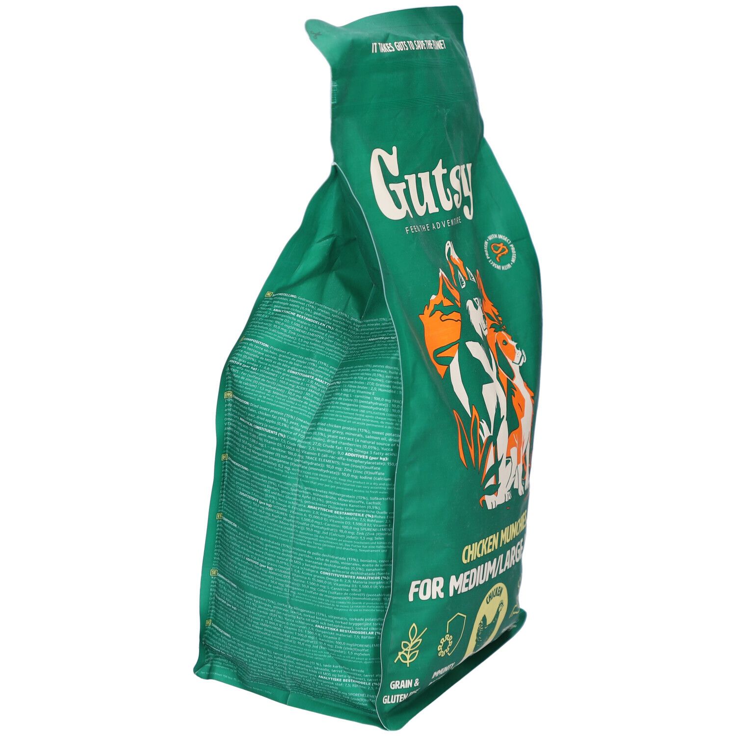 Grüne Tüte mit Hundefutter, schräg. Aufschrift: Gutsy Chicken Munchies. Illustration von Hunden. Seite mit Text.