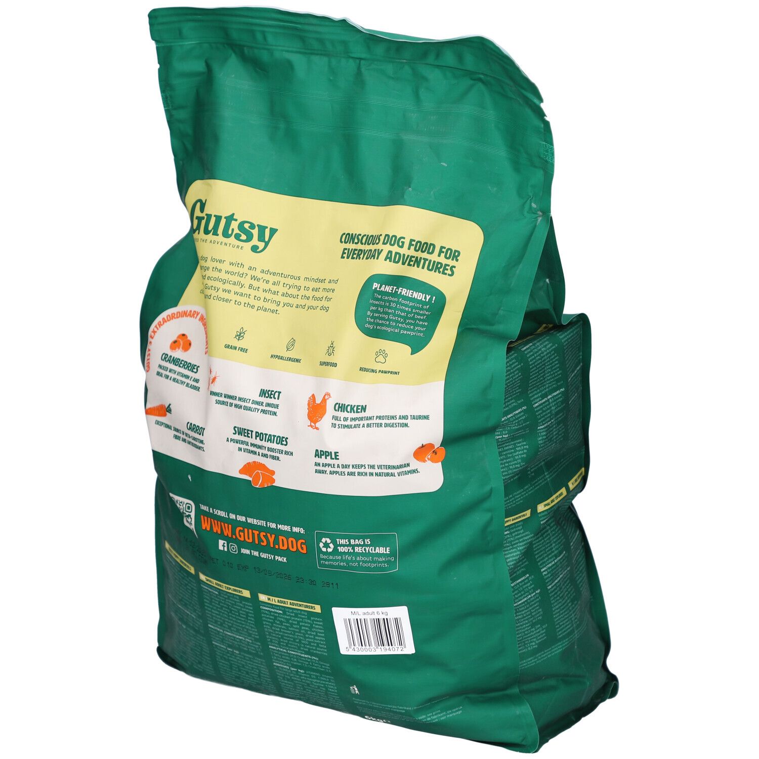 Grüne Tüte mit Gutsy-Logo und Hunden. Text: Chicken Munchies für mittelgroße/große Hunde. Rückseite mit Zutaten.