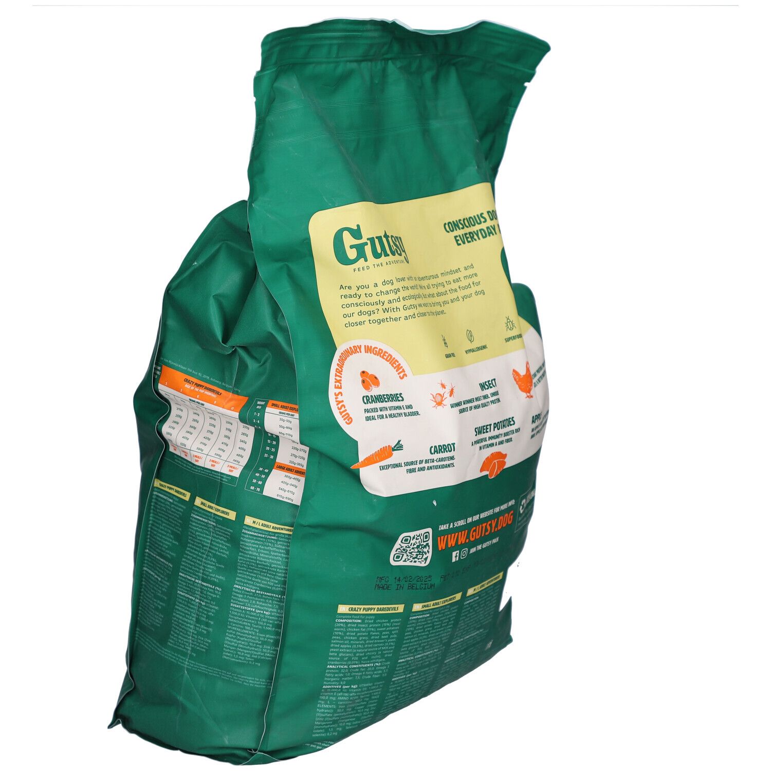 Grüne Tüte mit Gutsy-Logo und Hunden. Text: Chicken Munchies für mittelgroße/große Hunde. Rückseite mit Zutaten.